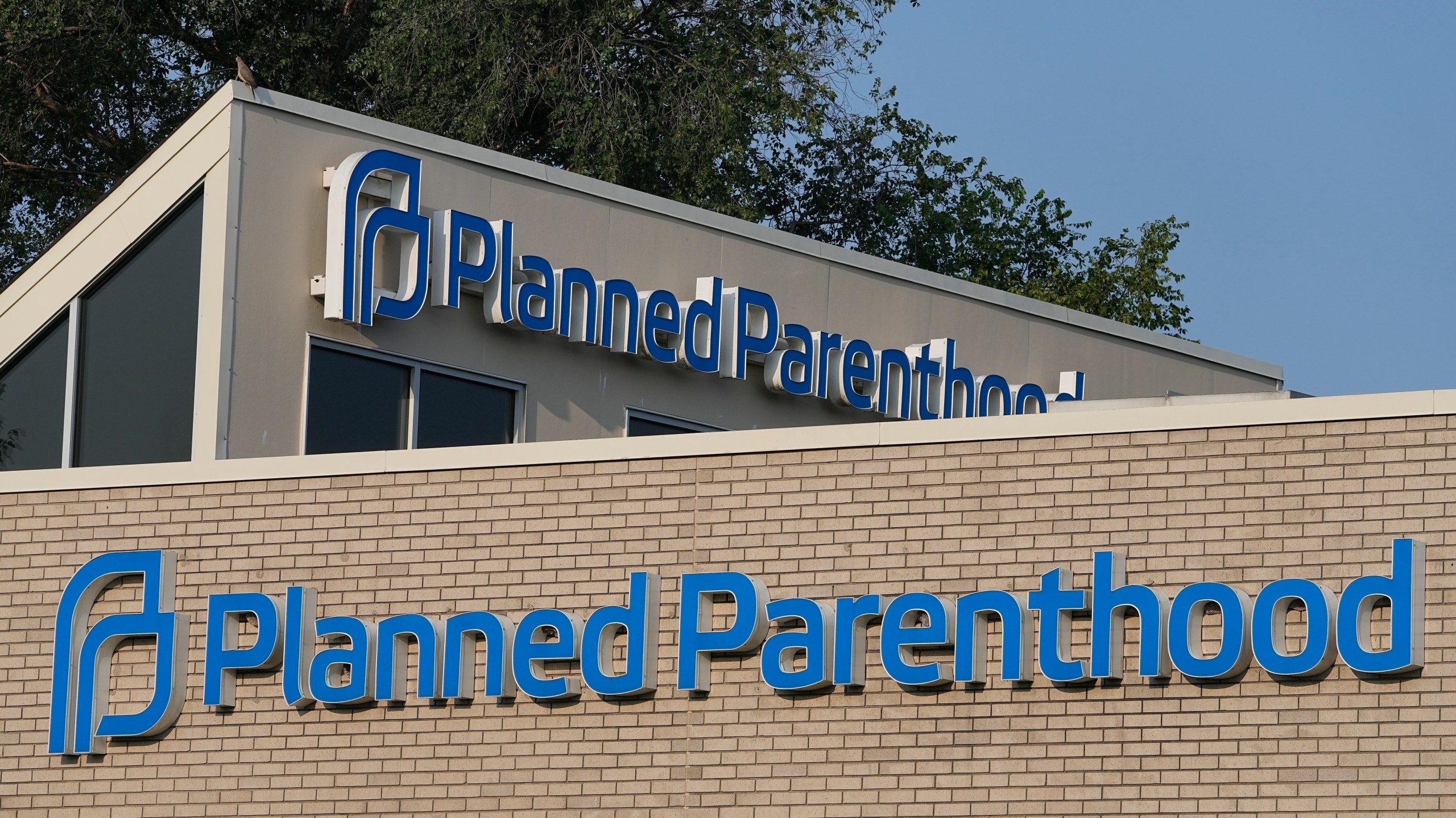 FILE - A Planned Parenthood sign is displayed on the outside of the clinic, Aug. 1, 2023, in Indianapolis. (AP Photo/Darron Cummings, File)