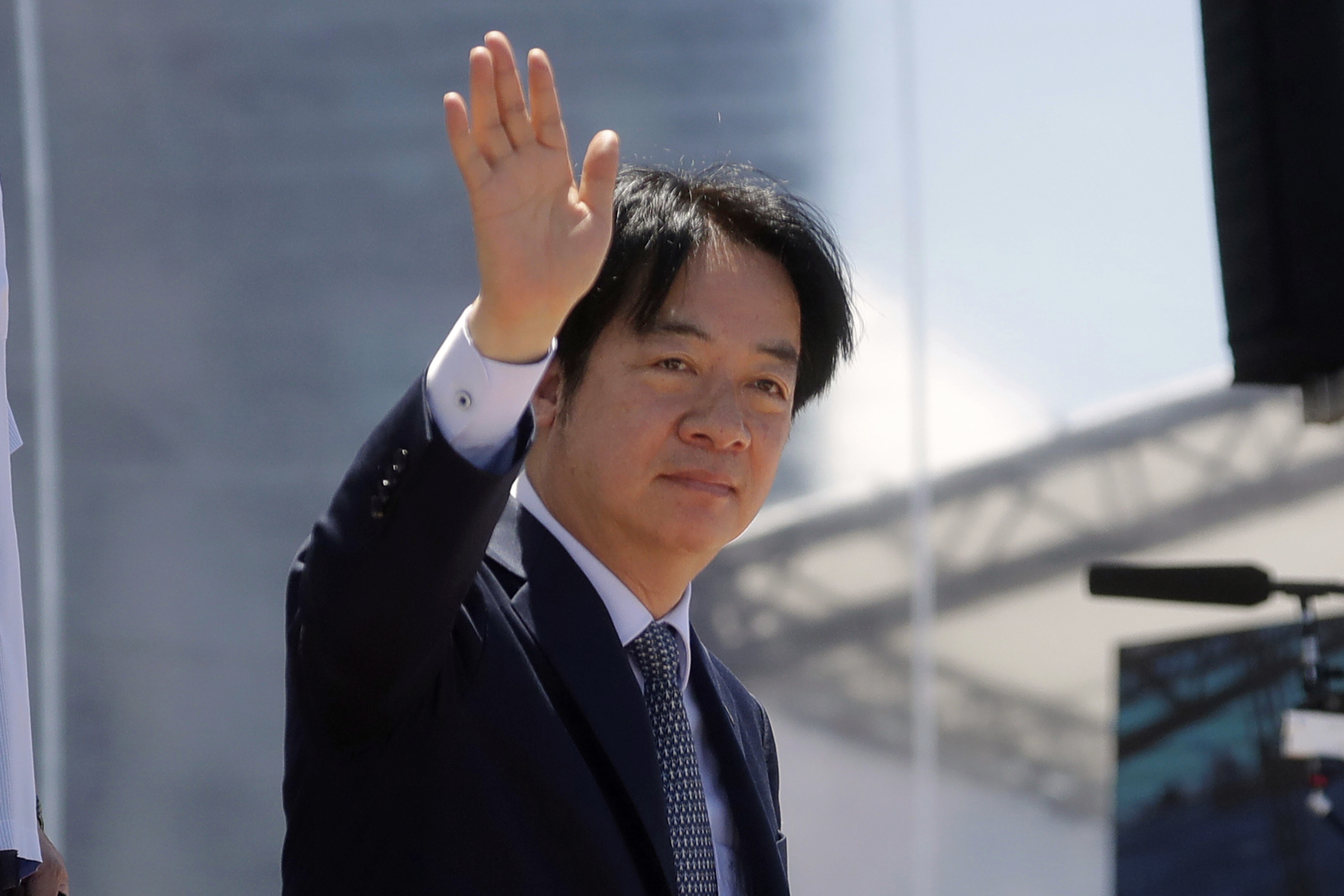 FILE - Taiwanese President Lai Ching-te waves after an offshore anti-terrorism drill at the Kaohsiung harbor in Kaohsiung, southern Taiwan, June 8, 2025. (AP Photo/Chiang Ying-ying, File)