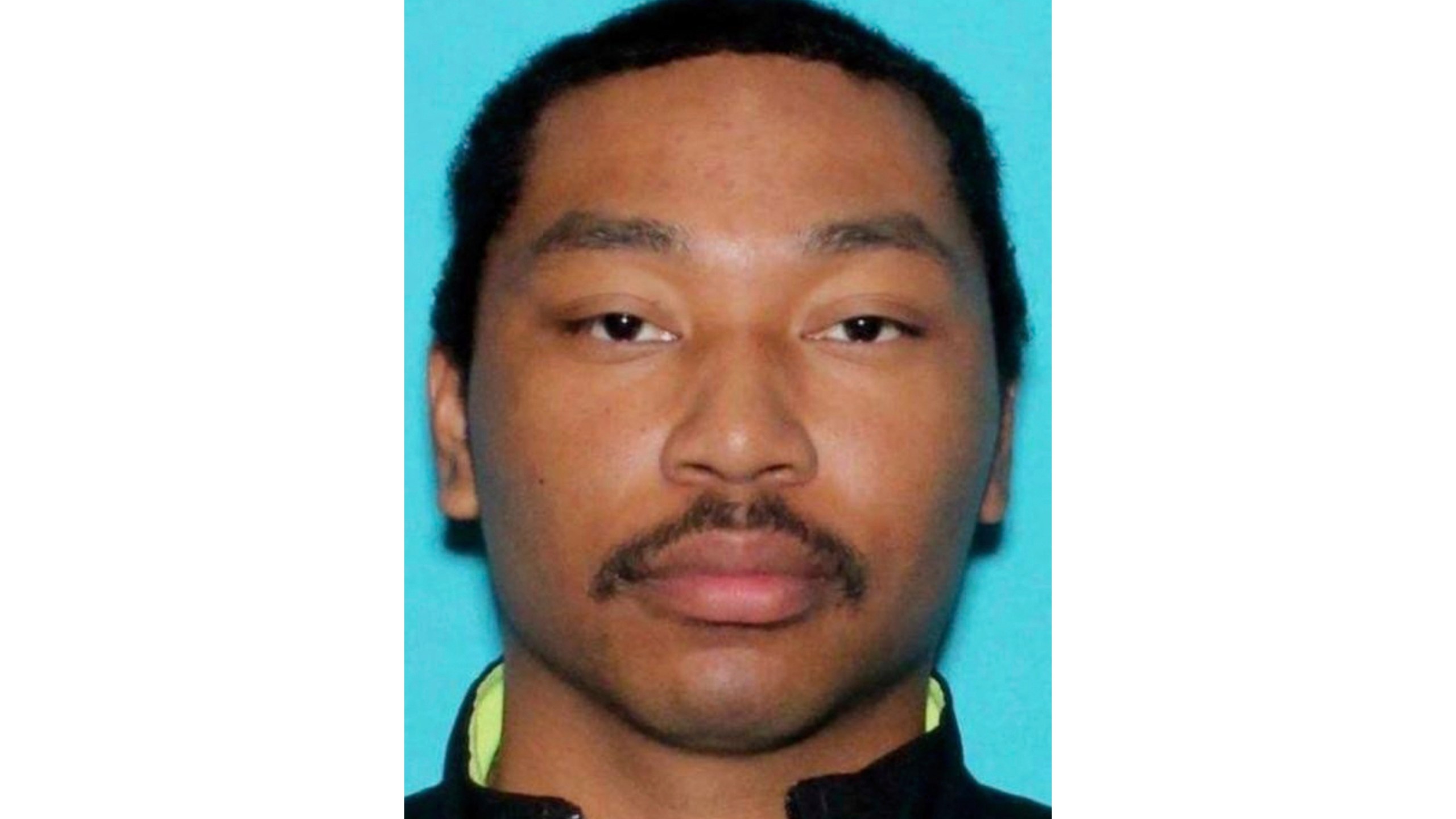 CORRECTS TO NEVADA DEPT. OF MOTOR VEHICLES This undated image provided by Nevada Department of Motor Vehicles shows Shane Tamura. (Nevada Dept. of Motor Vehicles via AP)