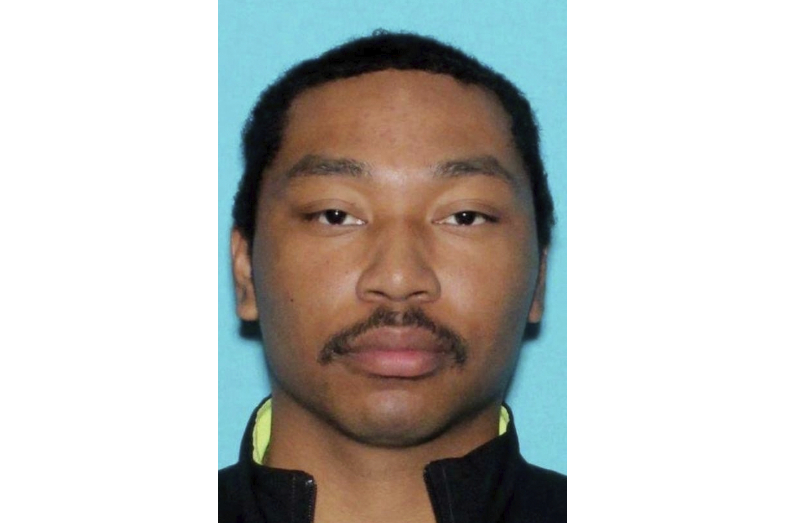 CORRECTS TO NEVADA DEPT. OF MOTOR VEHICLES This undated image provided by Nevada Department of Motor Vehicles shows Shane Tamura. (Nevada Dept. of Motor Vehicles via AP)