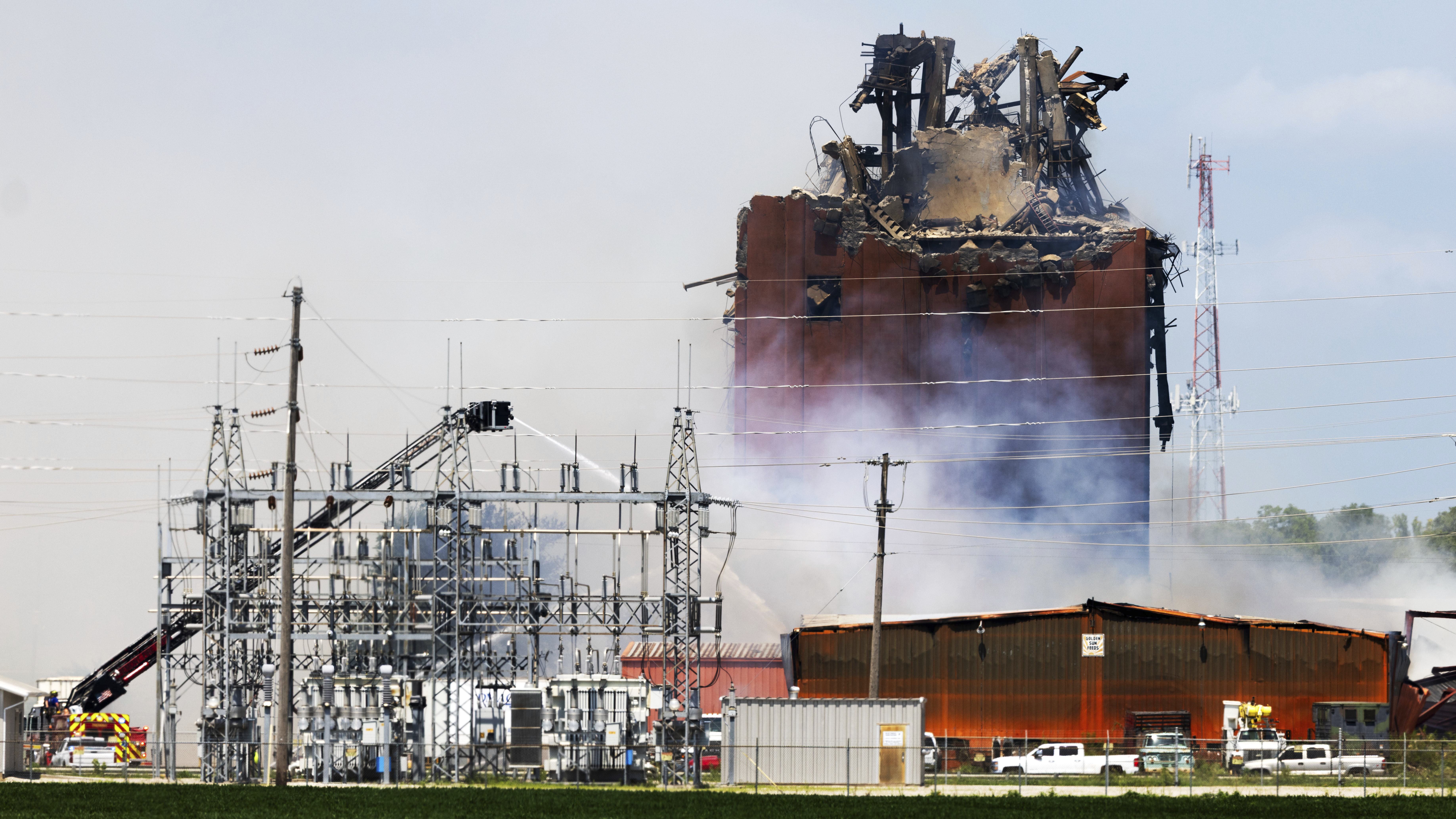 Firefighters battle a fire after an explosion in an industrial area in Fremont, Neb., Tuesday, July 29, 2025. (Chris Machian/Omaha World-Herald via AP)