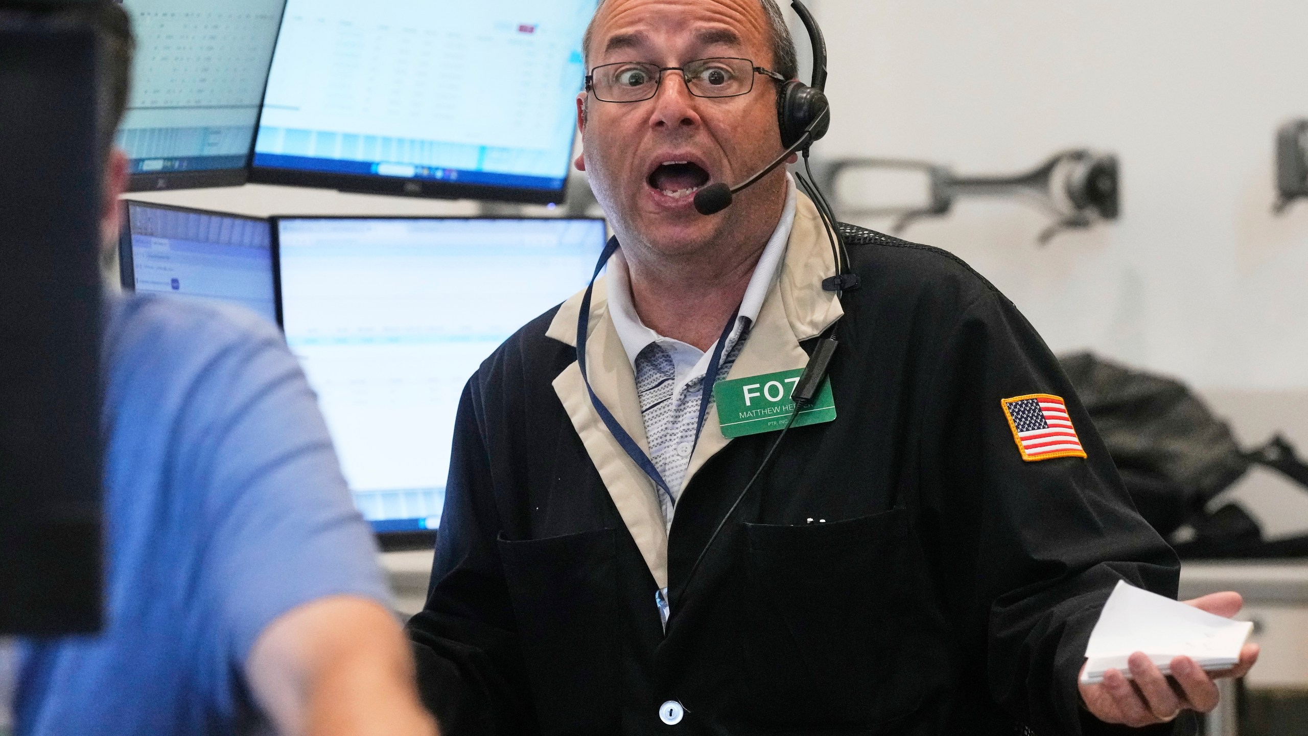 Options trader Matthew Hefner works on the floor of the New York Stock Exchange, Tuesday, July 29, 2025. (AP Photo/Richard Drew)