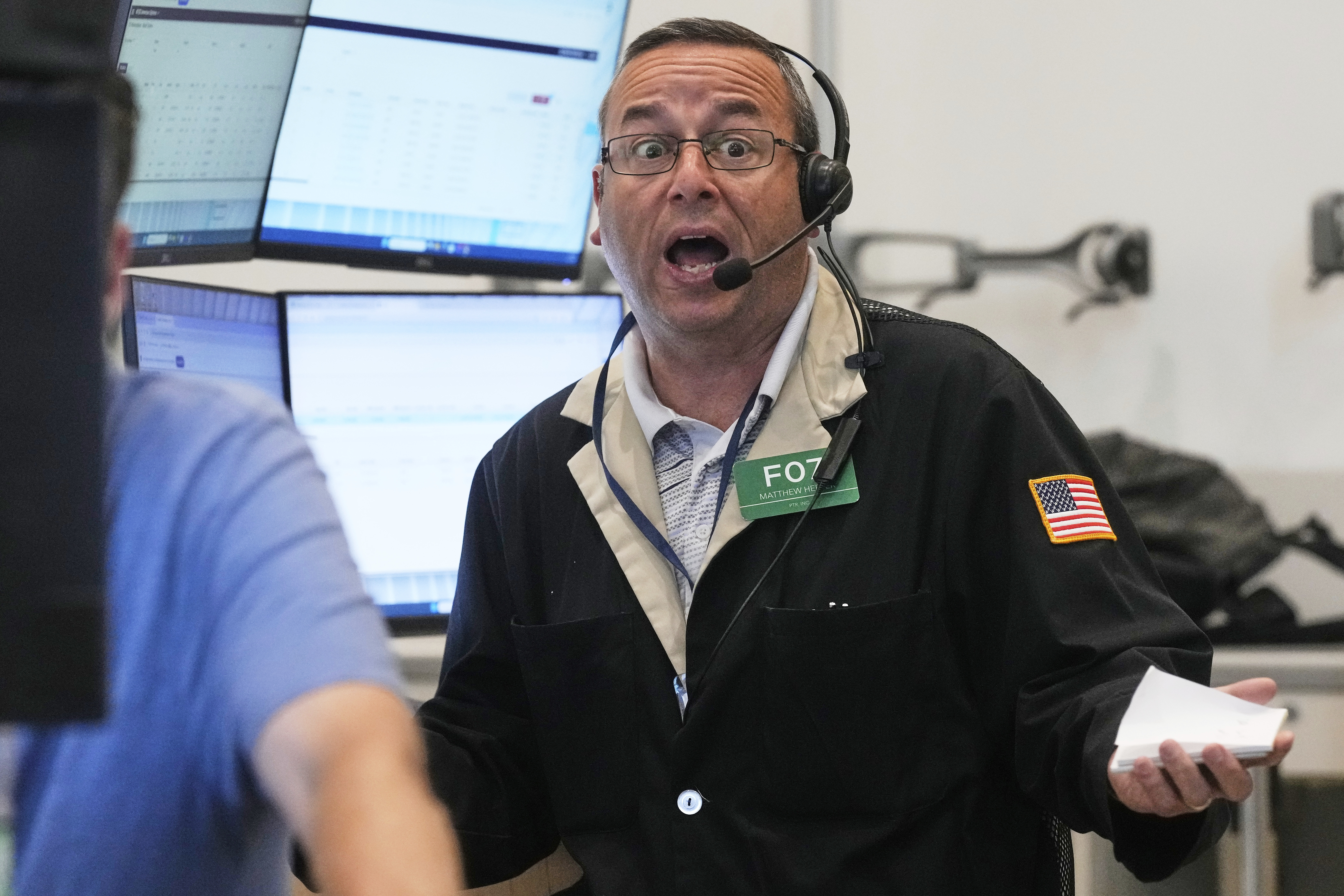 Options trader Matthew Hefner works on the floor of the New York Stock Exchange, Tuesday, July 29, 2025. (AP Photo/Richard Drew)