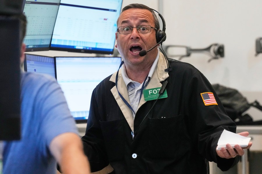 Options trader Matthew Hefner works on the floor of the New York Stock Exchange, Tuesday, July 29, 2025. (AP Photo/Richard Drew)