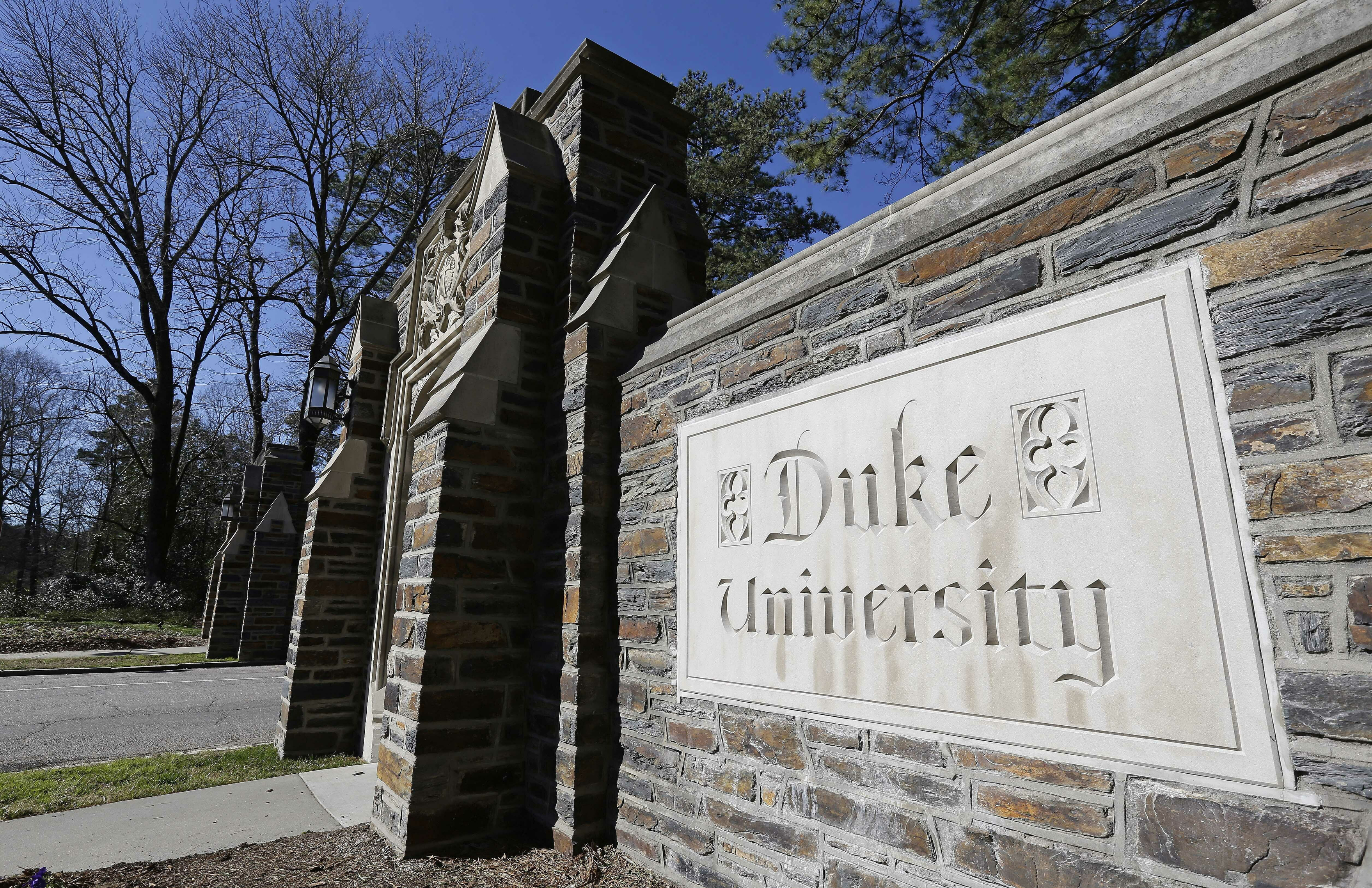 FILE - This Jan. 28, 2019 file photo shows the entrance to the main Duke University campus in Durham, N.C. (AP Photo/Gerry Broome, File)