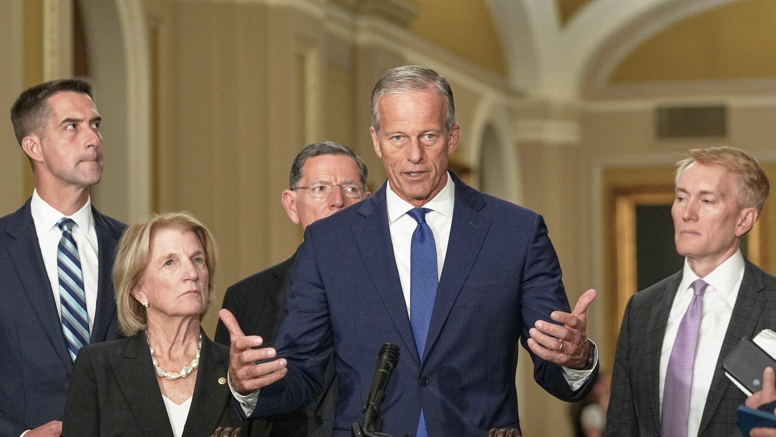 Sen. Majority Leader John Thune, R-S.D., center, speaks during a news conference after a policy luncheon at the Capitol Tuesday, July 29, 2025, in Washington. (AP Photo/Mariam Zuhaib)