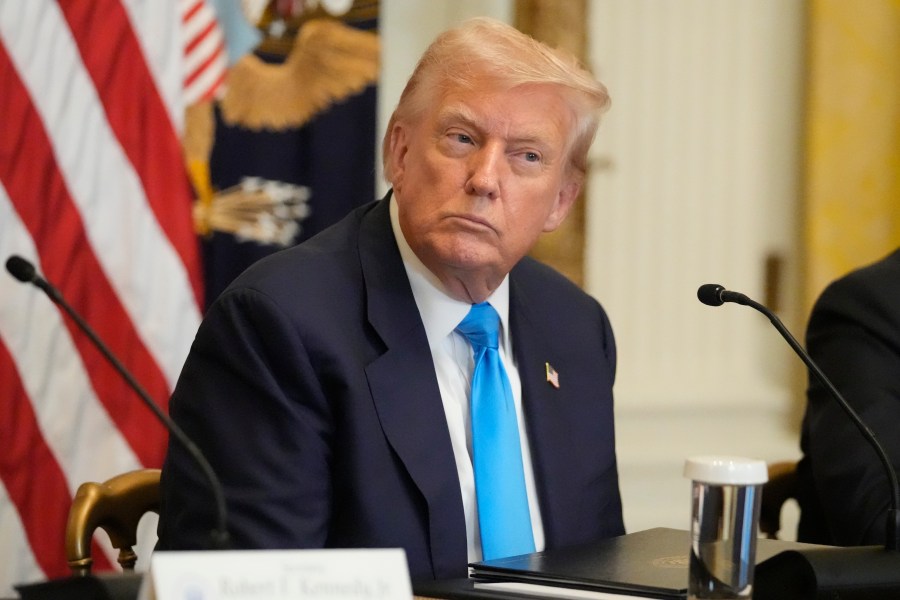 President Donald Trump listens at an event to promote his proposal to improve Americans' access to their medical records in the East Room of the White House, Wednesday, July 30, 2025, in Washington. (AP Photo/Mark Schiefelbein)