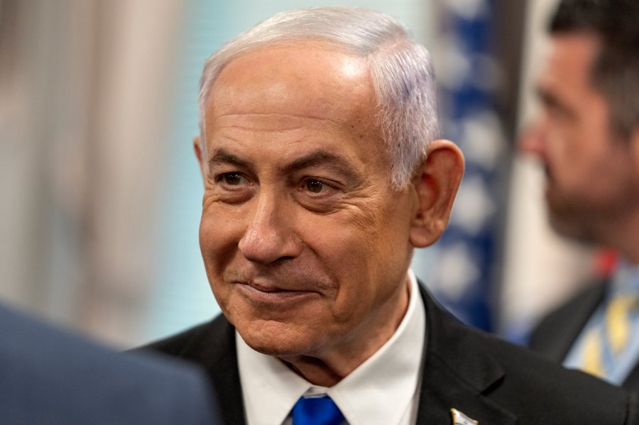Israeli Prime Minister Benjamin Netanyahu arrives for a meeting with Defense Secretary Pete Hegseth at the Pentagon, Wednesday, July 9, 2025, in Washington. (AP Photo/Mark Schiefelbein)