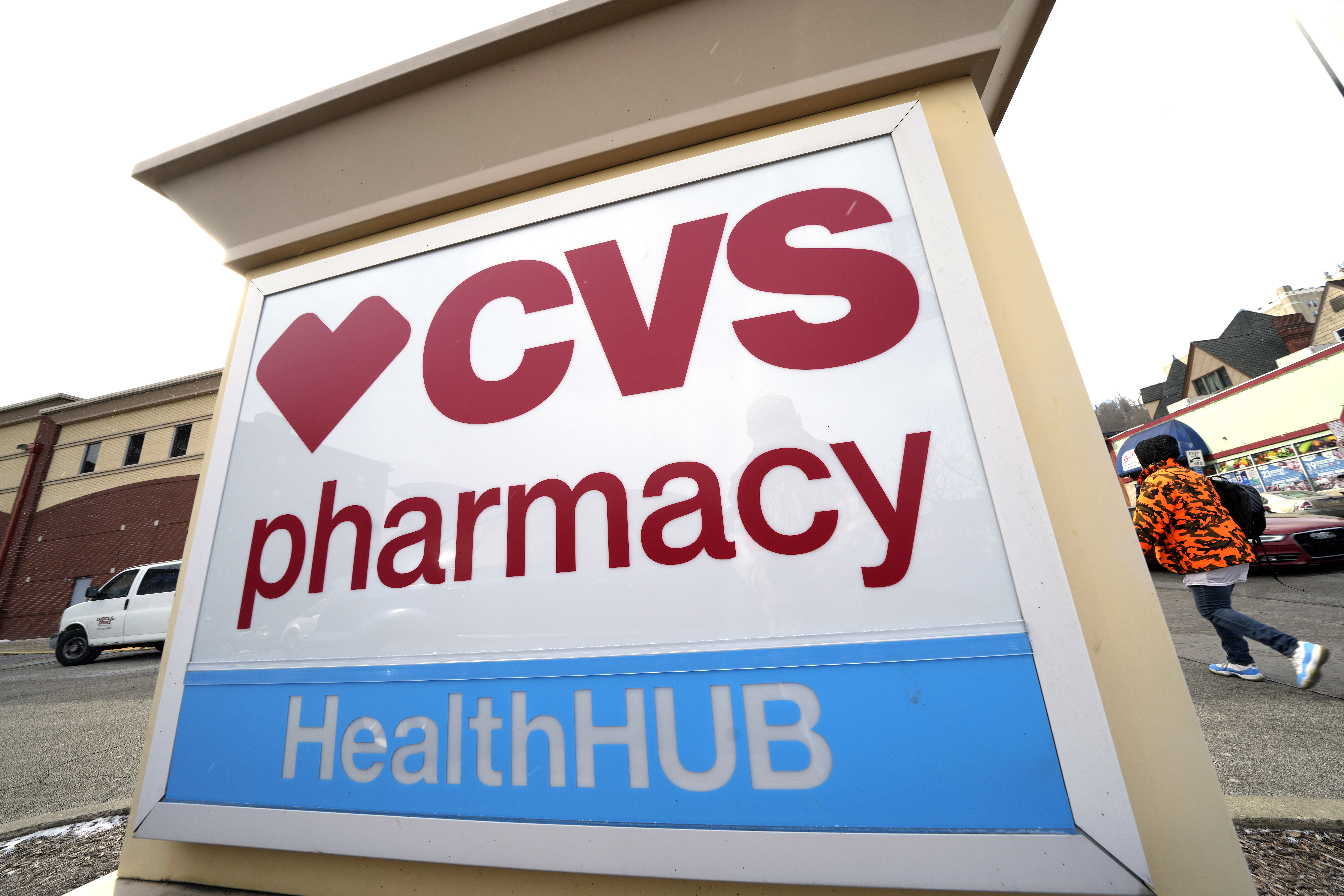 FILE - A CVS store sign is displayed in Pittsburgh on Friday, Feb. 3, 2023. (AP Photo/Gene J. Puskar, File)
