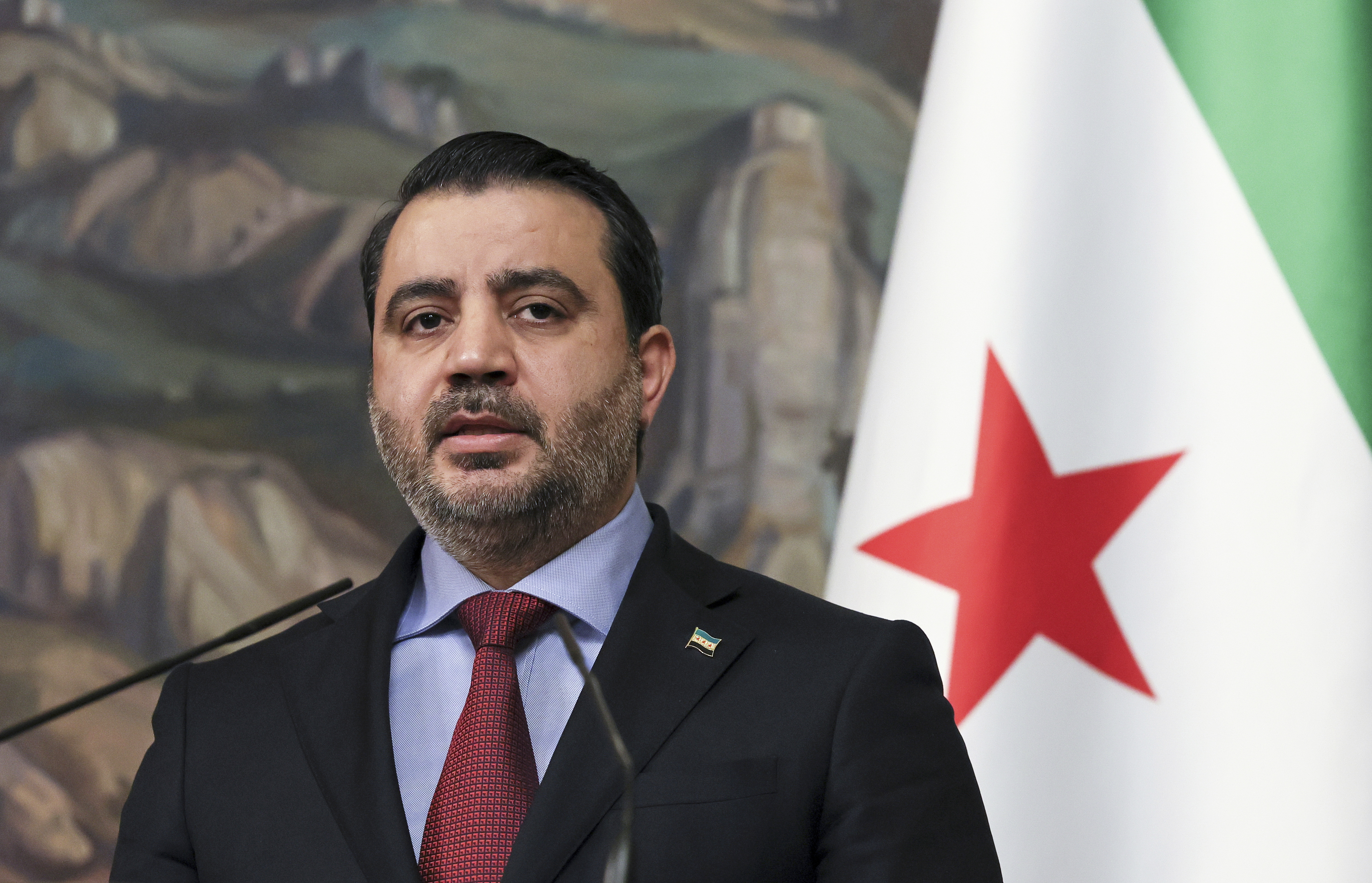 Syrian Foreign Minister Asaad Hassan al-Shibani attends a joint news conference with Russian Foreign Minister Sergey Lavrov following their meeting in Moscow, Russia, Thursday, July 31, 2025. (Shamil Zhumatov/ Pool Photo via AP)