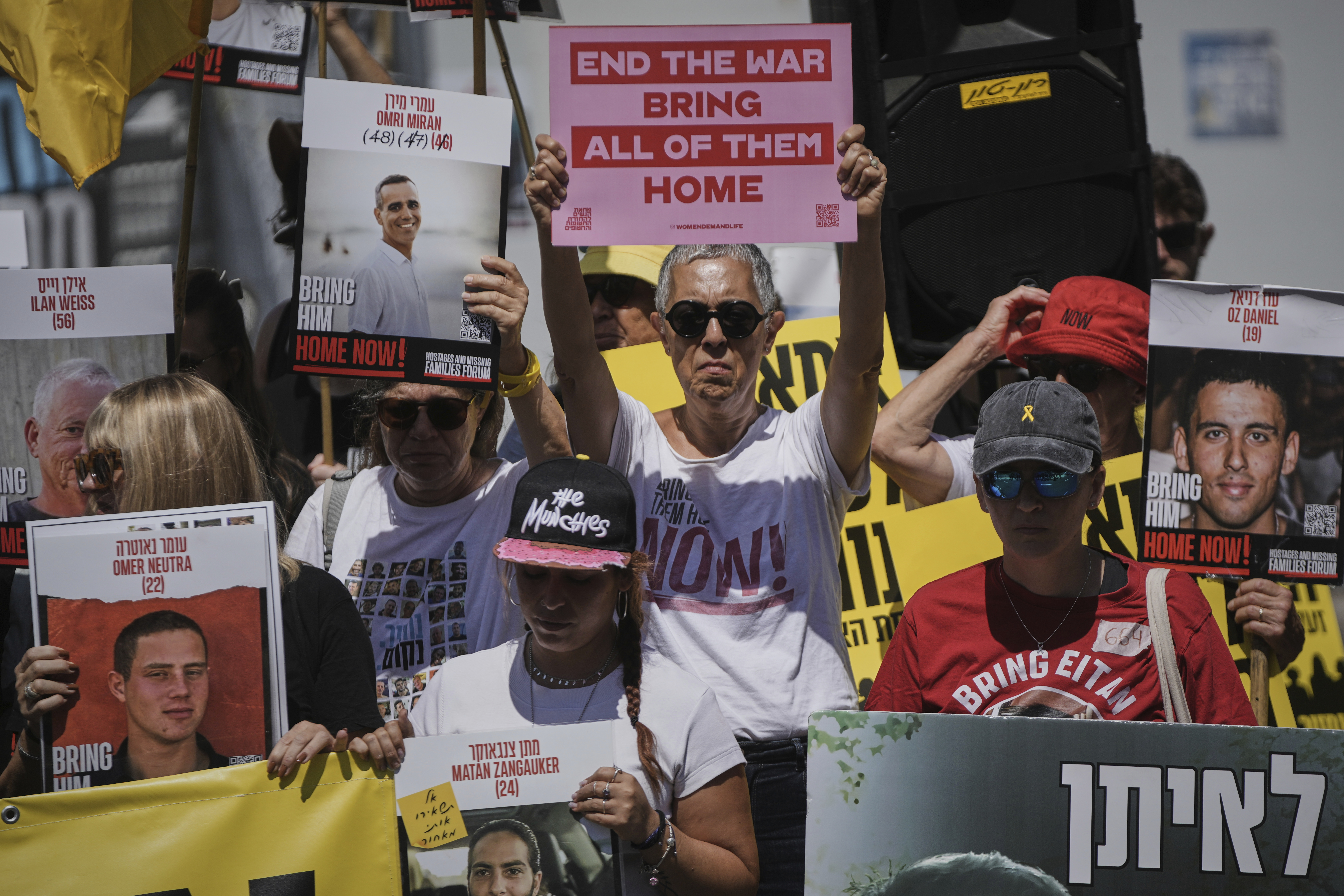 Relatives and supporters of Israeli hostages held in the Gaza Strip attend a protest demanding their release from Hamas captivity and calling for an end to the war, outside the Prime Minister's office in Jerusalem Thursday, July 31, 2025. (AP Photo/Mahmoud Illean)