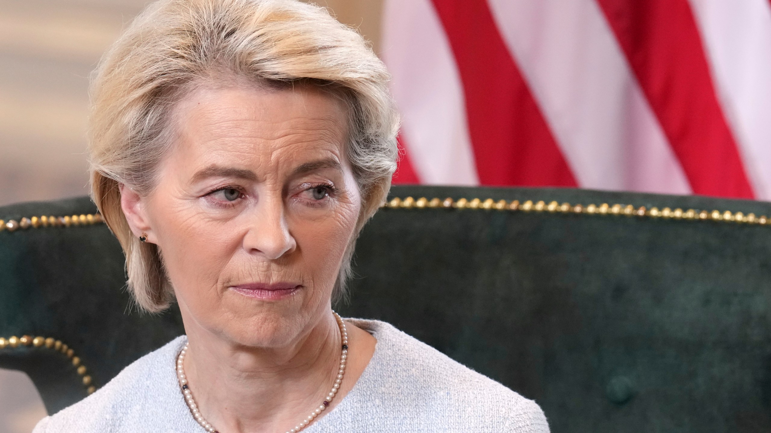 European Commission President Ursula von der Leyen listens as she meets President Donald Trump at the Trump Turnberry golf course in Turnberry, Scotland Sunday, July 27, 2025. (AP Photo/Jacquelyn Martin)