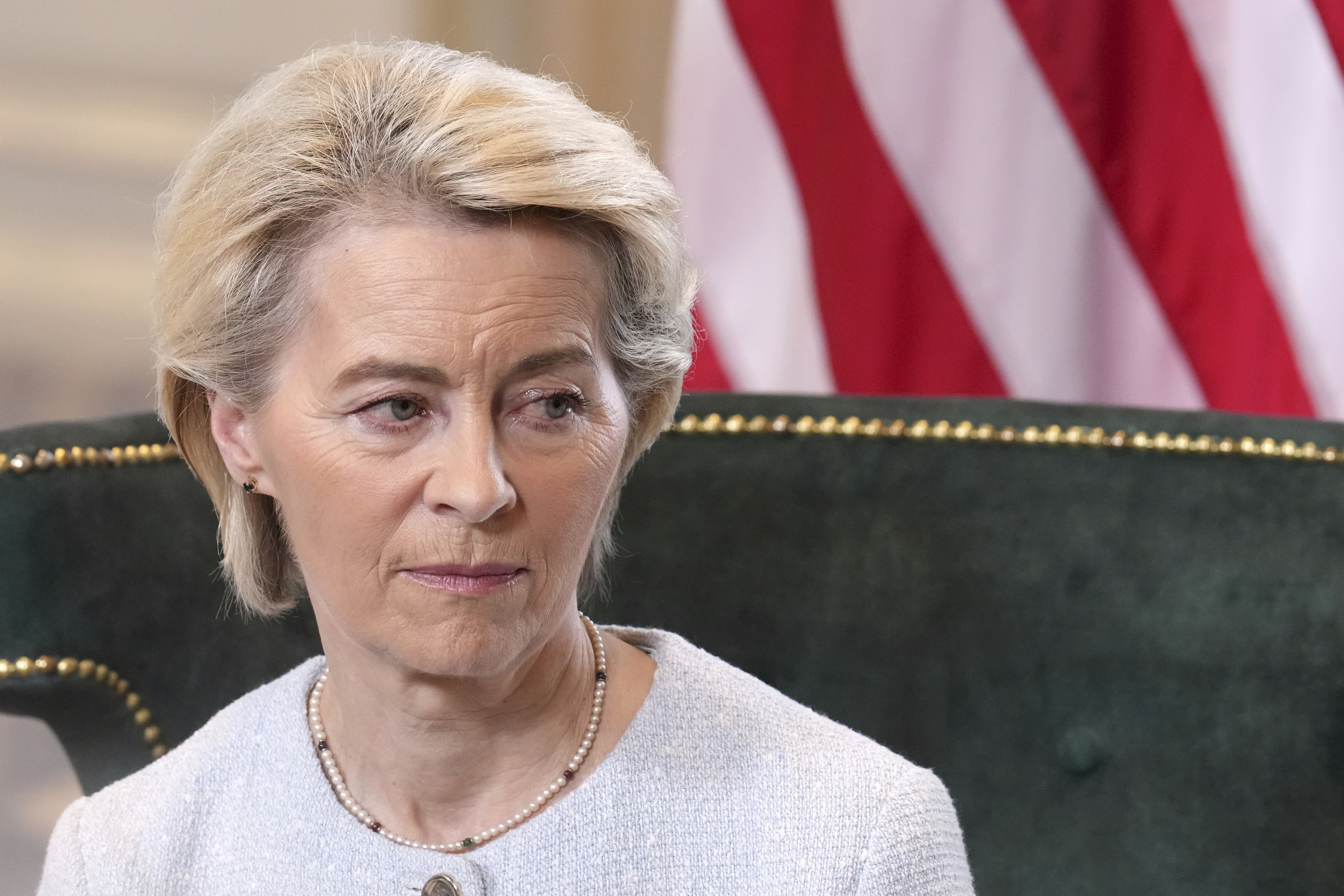 European Commission President Ursula von der Leyen listens as she meets President Donald Trump at the Trump Turnberry golf course in Turnberry, Scotland Sunday, July 27, 2025. (AP Photo/Jacquelyn Martin)