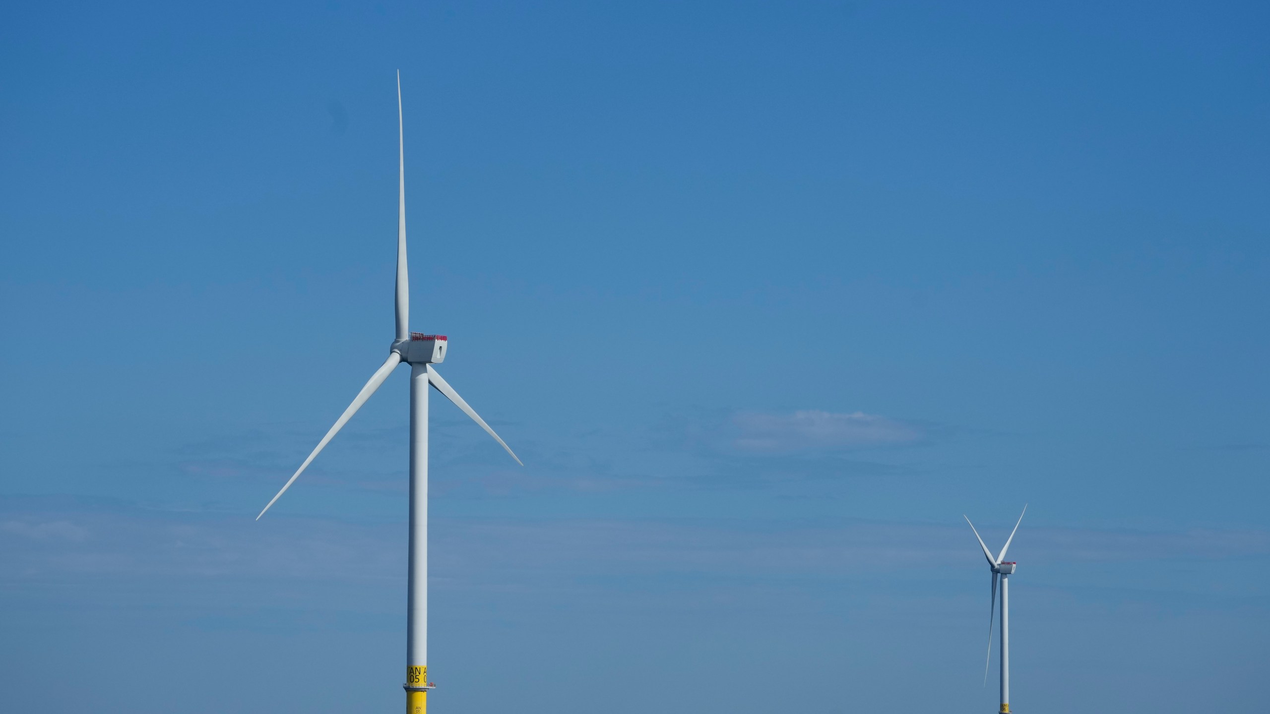 FILE - Offshore wind turbines of South Fork Wind operate off the coast of Block Island, R.I., Oct. 9, 2024. (AP Photo/Seth Wenig, File)