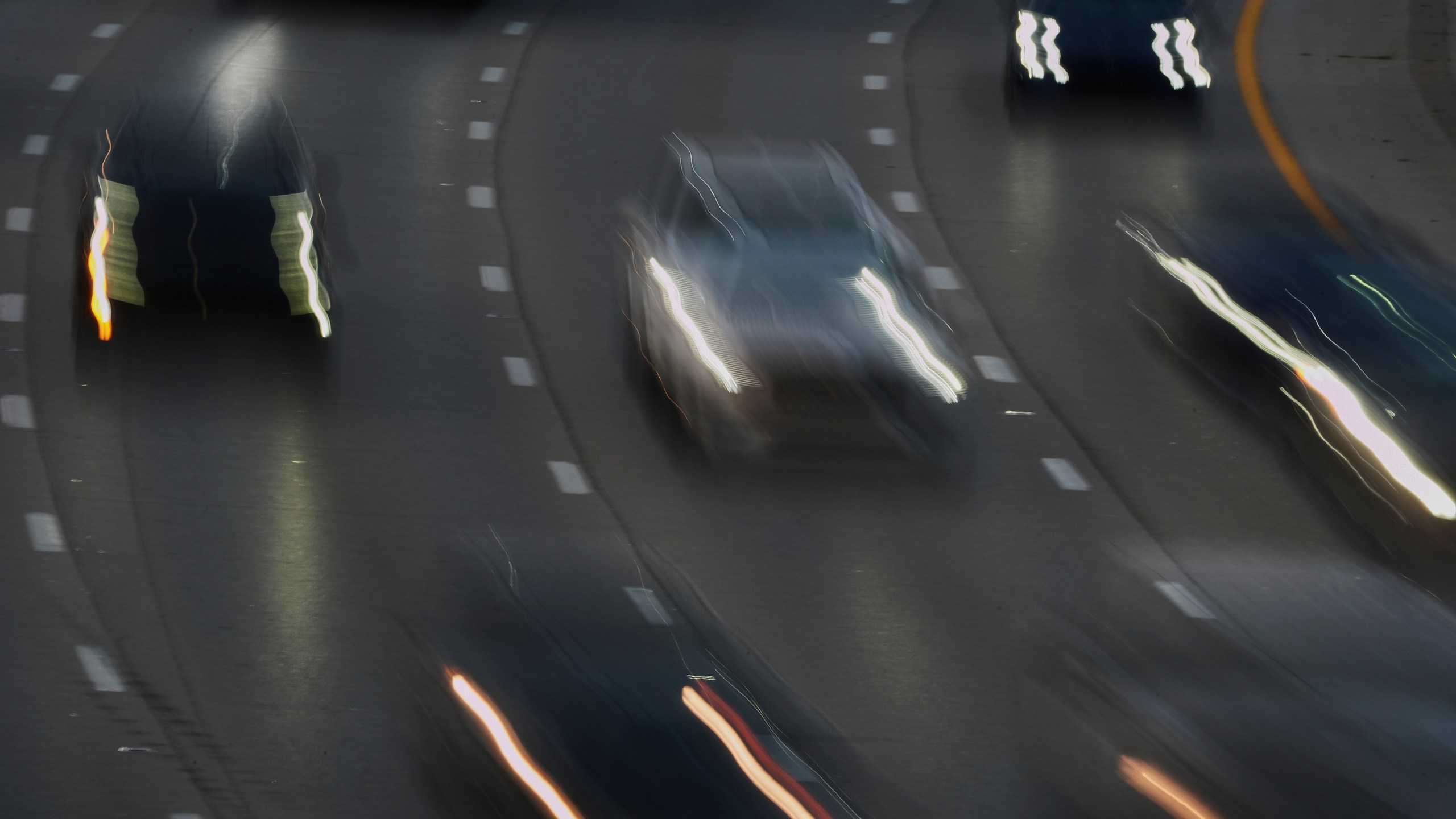 Vehicles drive along a highway Wednesday, July 30, 2025, in Cincinnati. (AP Photo/Joshua A. Bickel)