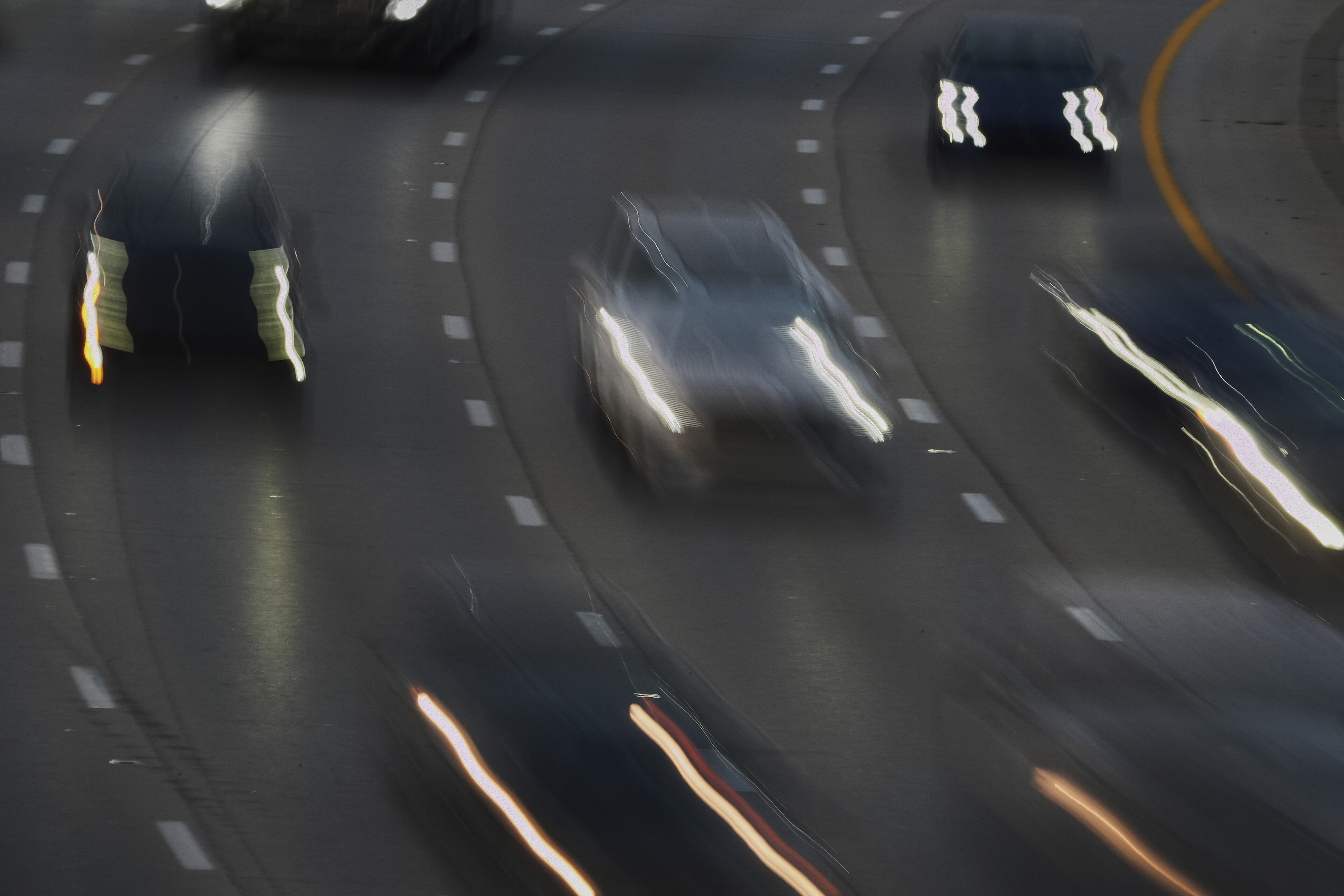 Vehicles drive along a highway Wednesday, July 30, 2025, in Cincinnati. (AP Photo/Joshua A. Bickel)