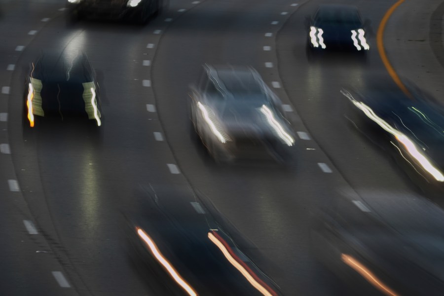 Vehicles drive along a highway Wednesday, July 30, 2025, in Cincinnati. (AP Photo/Joshua A. Bickel)