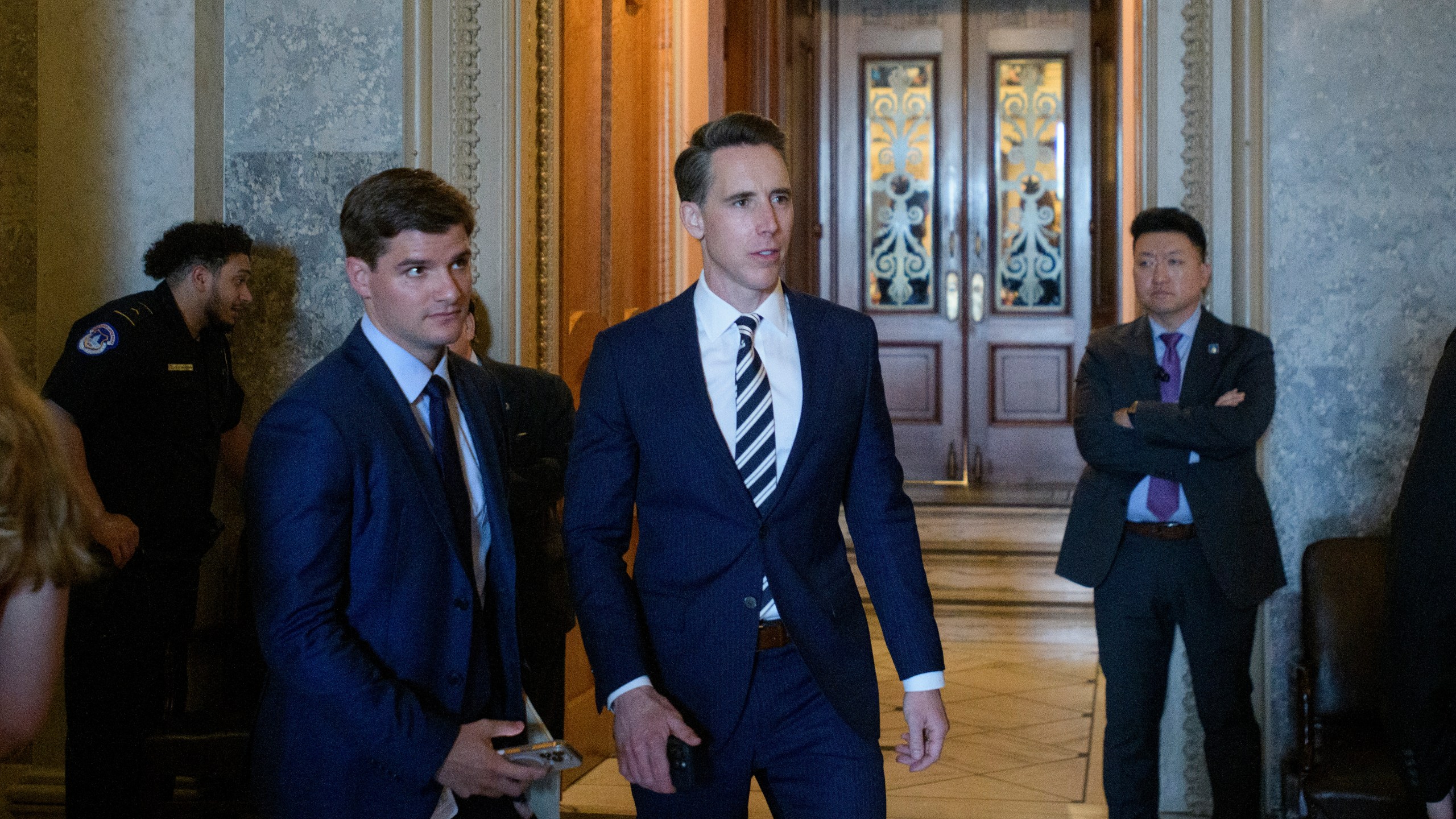 Sen. Josh Hawley, R-Mo., walks from the Senate chamber as Senate Republicans vote on President Donald Trump's request to cancel about $9 billion in foreign aid and public broadcasting spending, at the Capitol in Washington, Wednesday, July 16, 2025. (AP Photo/Rod Lamkey, Jr.)