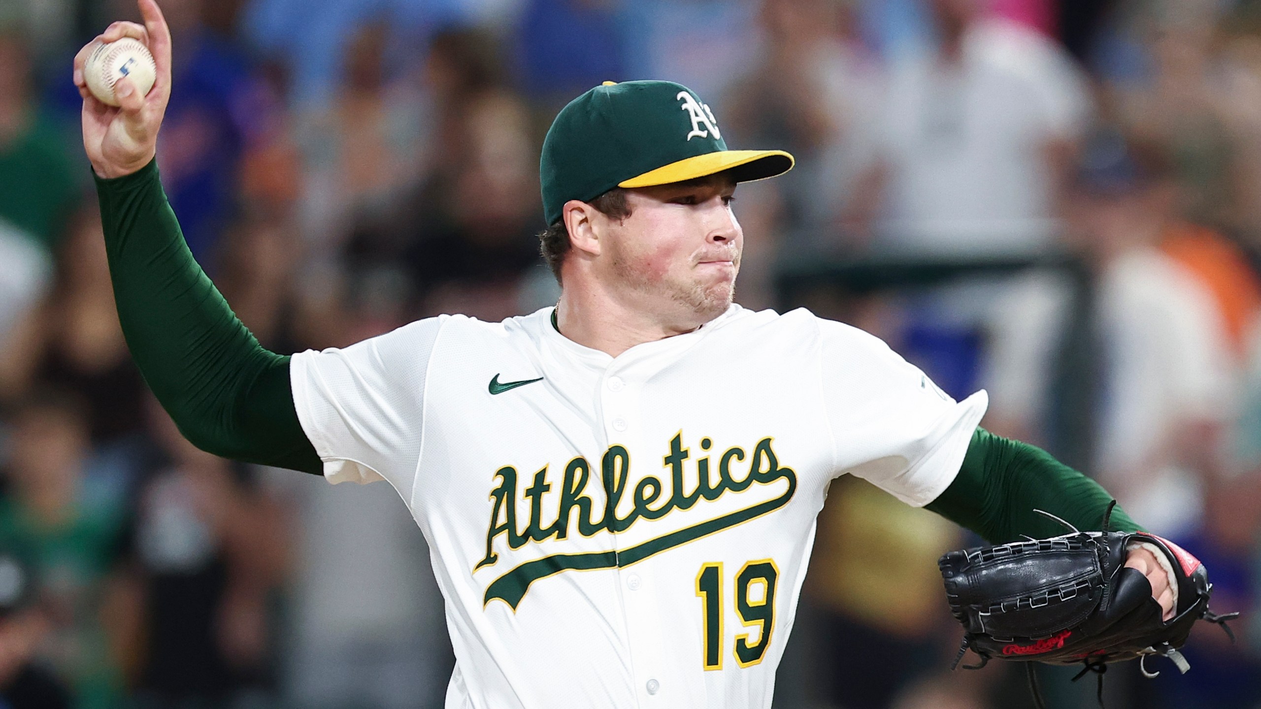 Athletics pitcher Mason Miller throws to the Toronto Blue Jays during the ninth inning of a baseball game Saturday, July 12, 2025, in West Sacramento, Calif. (AP Photo/Sara Nevis)