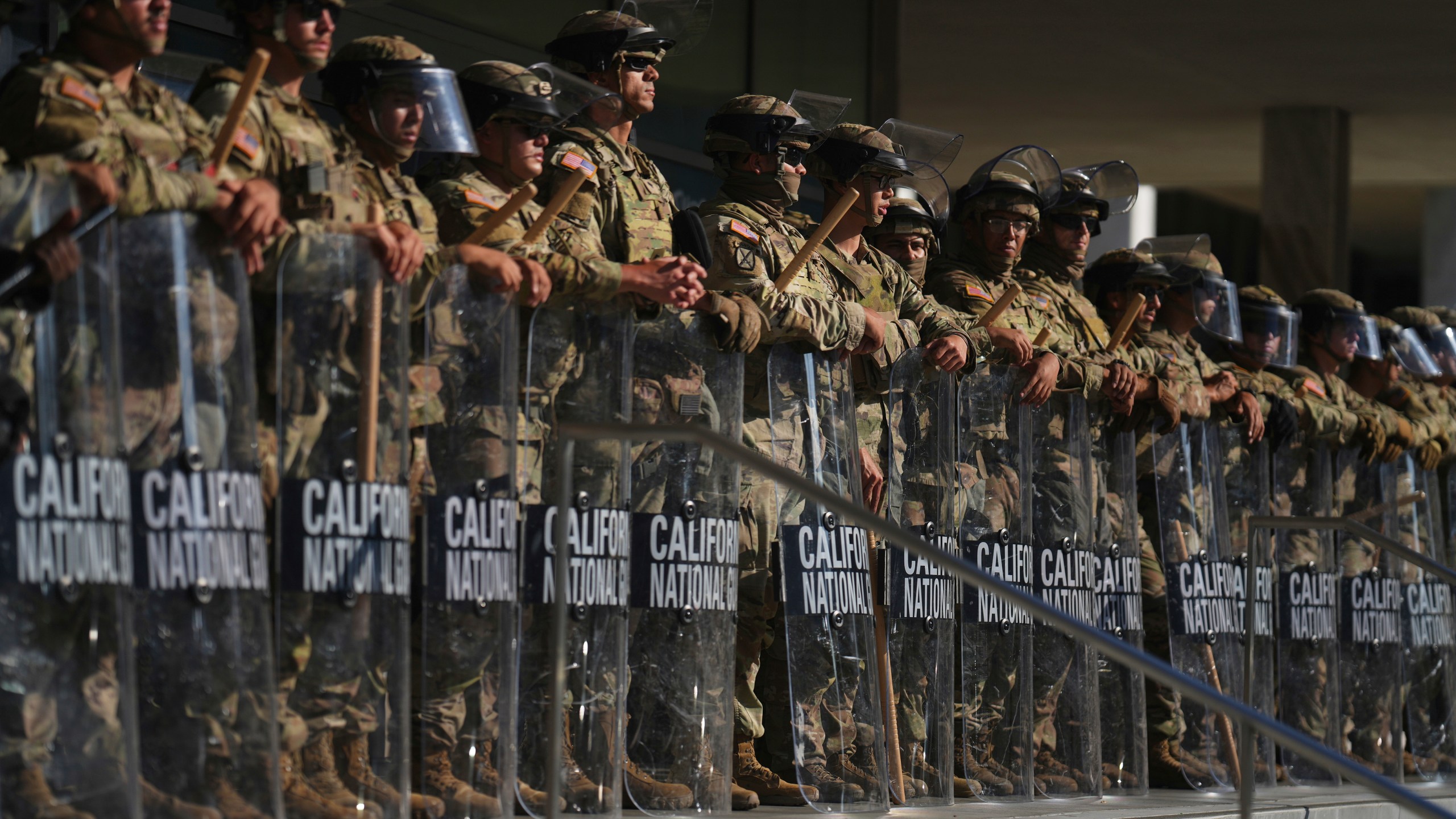 FILE - California National Guard are positioned at the Federal Building, June 10, 2025, in downtown Los Angeles. (AP Photo/Eric Thayer, File)