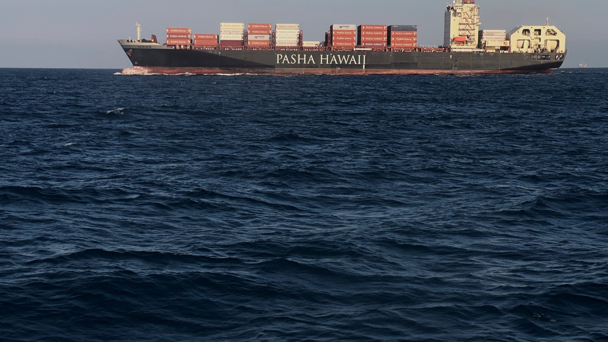 FILE - A cargo ship heads to Long Beach, Calif., in this June 19, 2025, file photo. (AP Photo/Robert F. Bukaty, files)