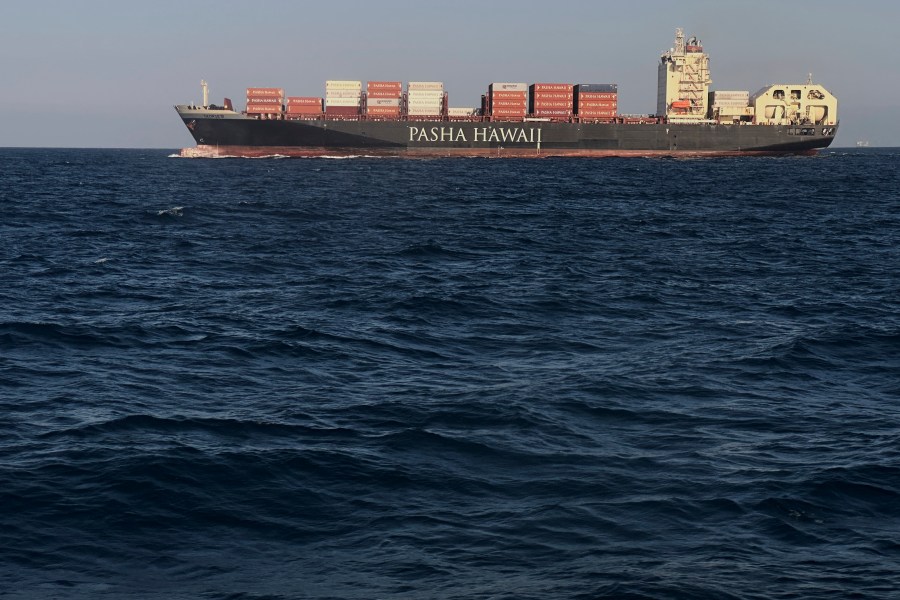 FILE - A cargo ship heads to Long Beach, Calif., in this June 19, 2025, file photo. (AP Photo/Robert F. Bukaty, files)