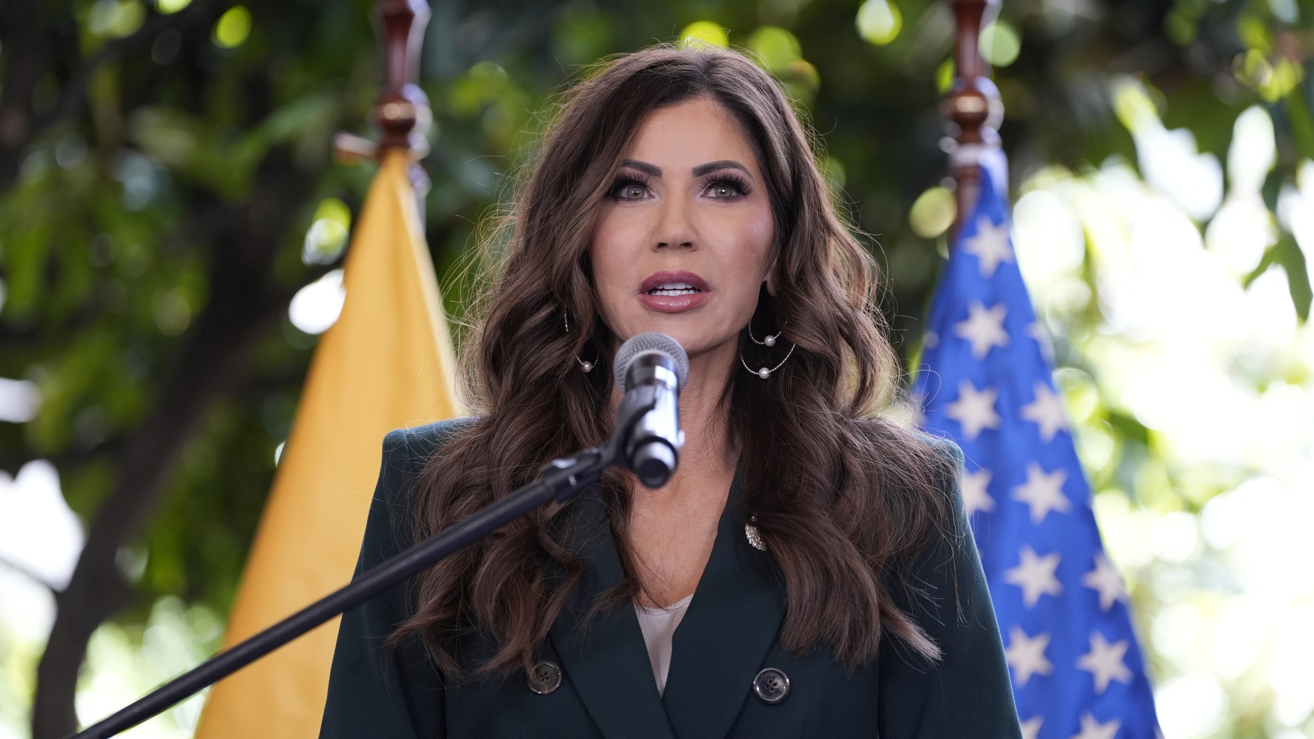 U.S. Homeland Security Secretary Kristi Noem, with Ecuador's Minister of Interior John Reinberg, not shown, holds a press briefing at the Ecuadorian Presidential Palace, Thursday, July 31, 2025, in Quito, Ecuador. (AP Photo/Alex Brandon, Pool)