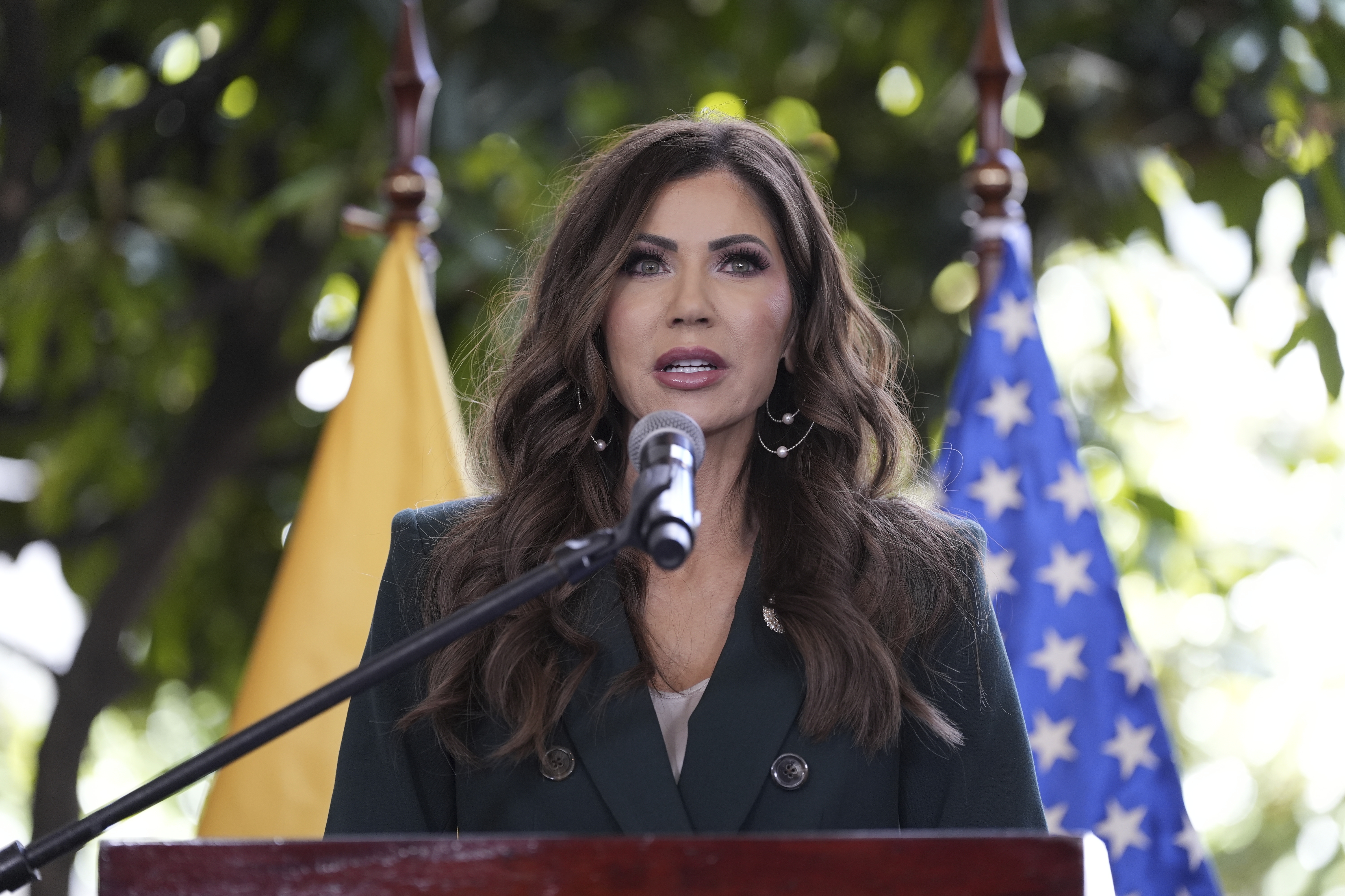 U.S. Homeland Security Secretary Kristi Noem, with Ecuador's Minister of Interior John Reinberg, not shown, holds a press briefing at the Ecuadorian Presidential Palace, Thursday, July 31, 2025, in Quito, Ecuador. (AP Photo/Alex Brandon, Pool)