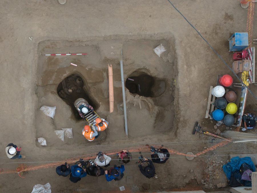 Archaeologist work at the site where city workers discovered ancient remains, from the pre-Inca Chancay culture, and artifacts as they were digging a natural gas line for the company Calidda in the district of Puente Piedra on the outskirts of Lima, Peru, Thursday, July 31, 2025. (AP Photo/Guadalupe Pardo)