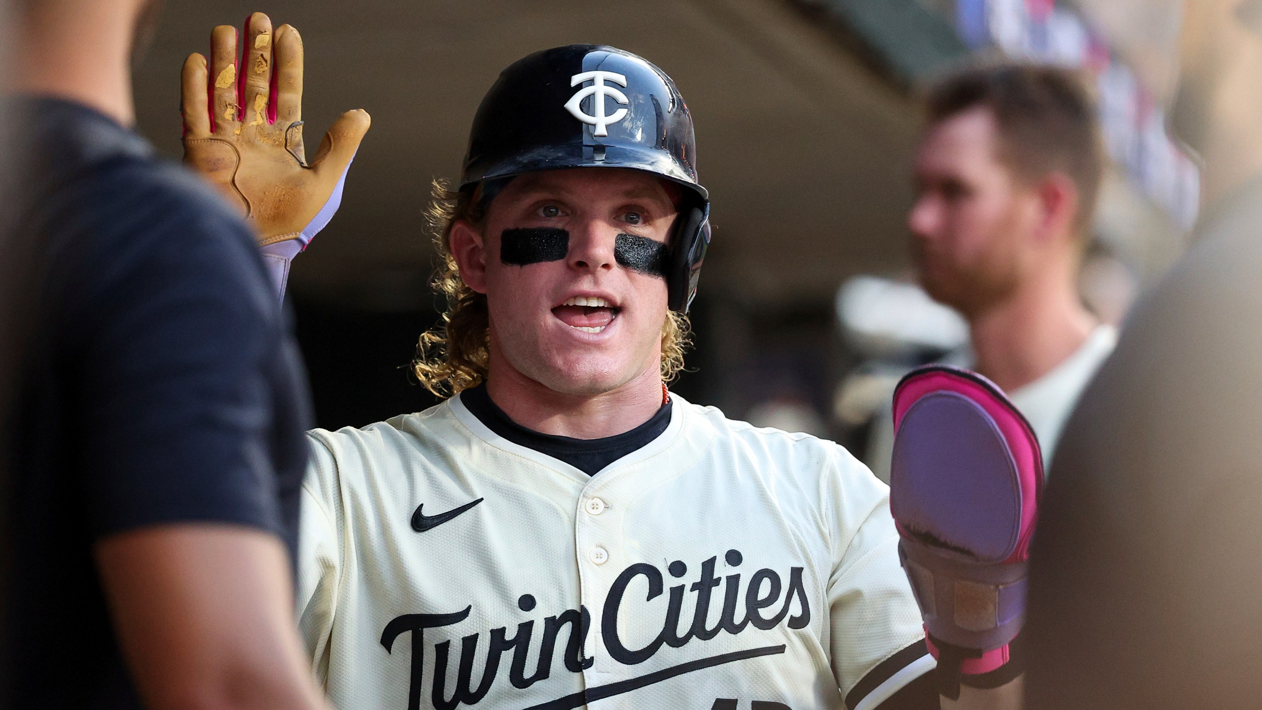 Minnesota Twins' Harrison Bader reacts after scoring on a RBI double hit by Brooks Lee during the fifth inning of baseball game against the Boston Red Sox Tuesday, July 29, 2025, in Minneapolis. (AP Photo/Matt Krohn)