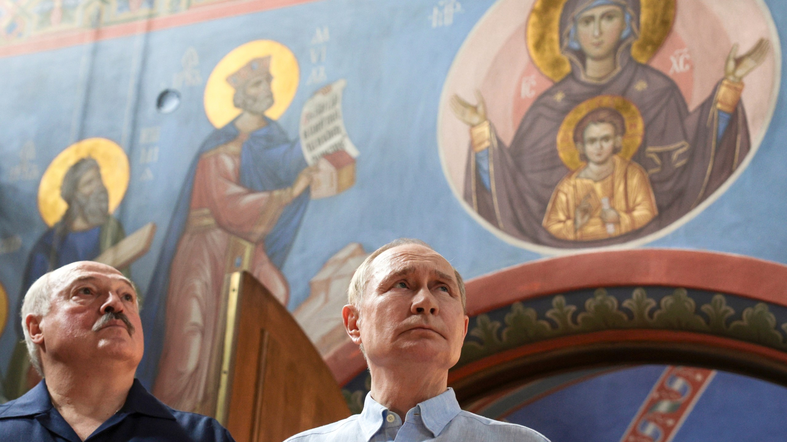 Russian President Vladimir Putin, right, and Belarusian President Alexander Lukashenko visit the Smolensky Skete of Valaam Monastery at Valaam island in Ladoga lake, Republic of Karelia, Russia, Friday, Aug. 1, 2025. (Gavriil Grigorov, Sputnik, Kremlin Pool Photo via AP)