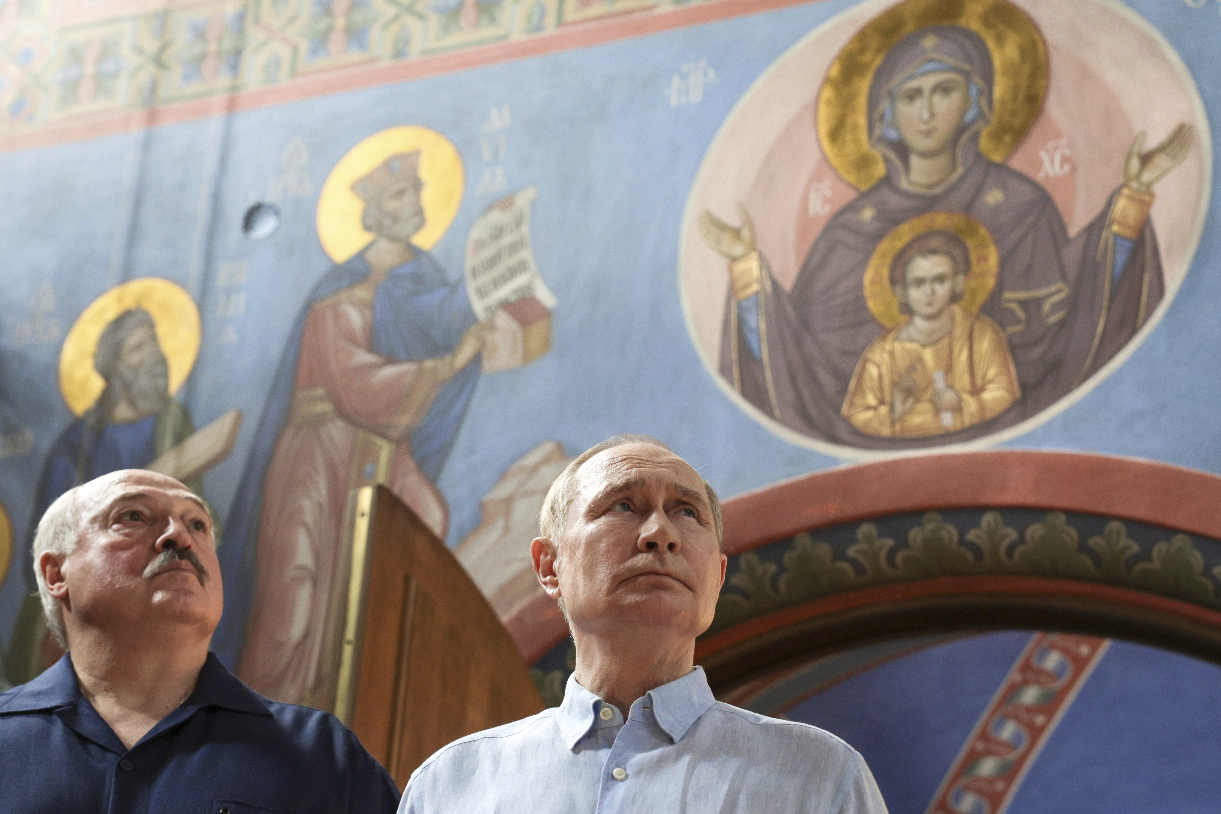 Russian President Vladimir Putin, right, and Belarusian President Alexander Lukashenko visit the Smolensky Skete of Valaam Monastery at Valaam island in Ladoga lake, Republic of Karelia, Russia, Friday, Aug. 1, 2025. (Gavriil Grigorov, Sputnik, Kremlin Pool Photo via AP)