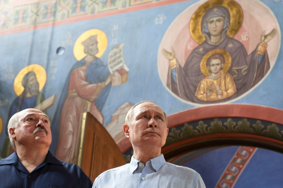 Russian President Vladimir Putin, right, and Belarusian President Alexander Lukashenko visit the Smolensky Skete of Valaam Monastery at Valaam island in Ladoga lake, Republic of Karelia, Russia, Friday, Aug. 1, 2025. (Gavriil Grigorov, Sputnik, Kremlin Pool Photo via AP)