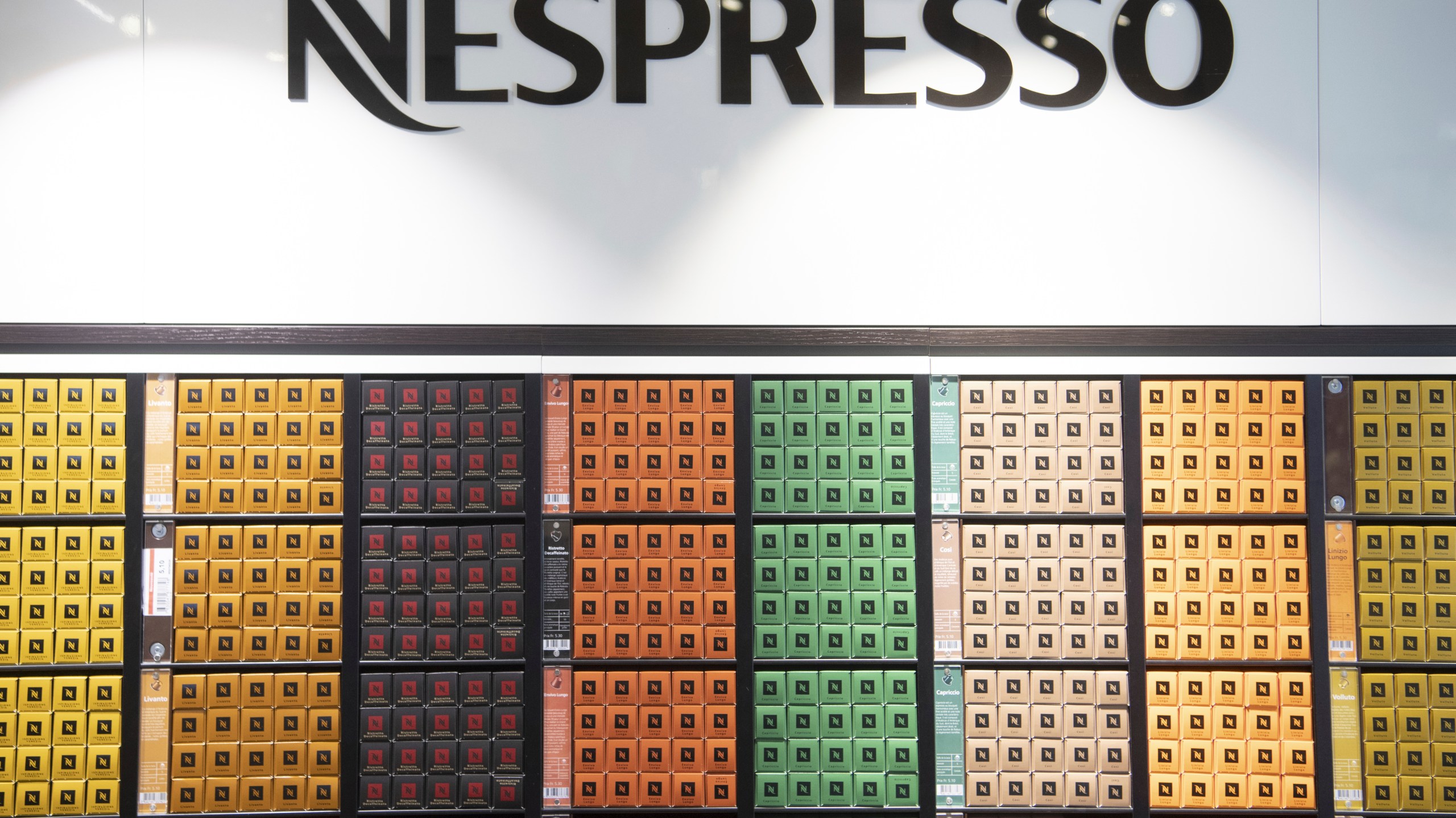 Nespresso cartons on display at the Nestle's own supermarket, in Vevey, Switzerland, Thursday, Feb. 13, 2020. (Laurent Gilliero/Keystone via AP)