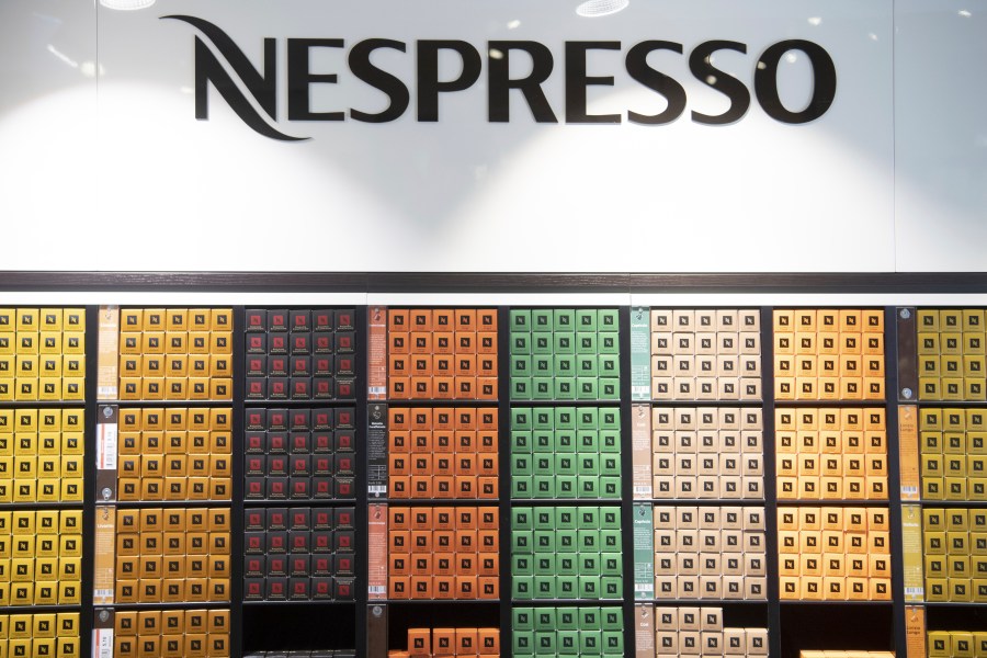 Nespresso cartons on display at the Nestle's own supermarket, in Vevey, Switzerland, Thursday, Feb. 13, 2020. (Laurent Gilliero/Keystone via AP)