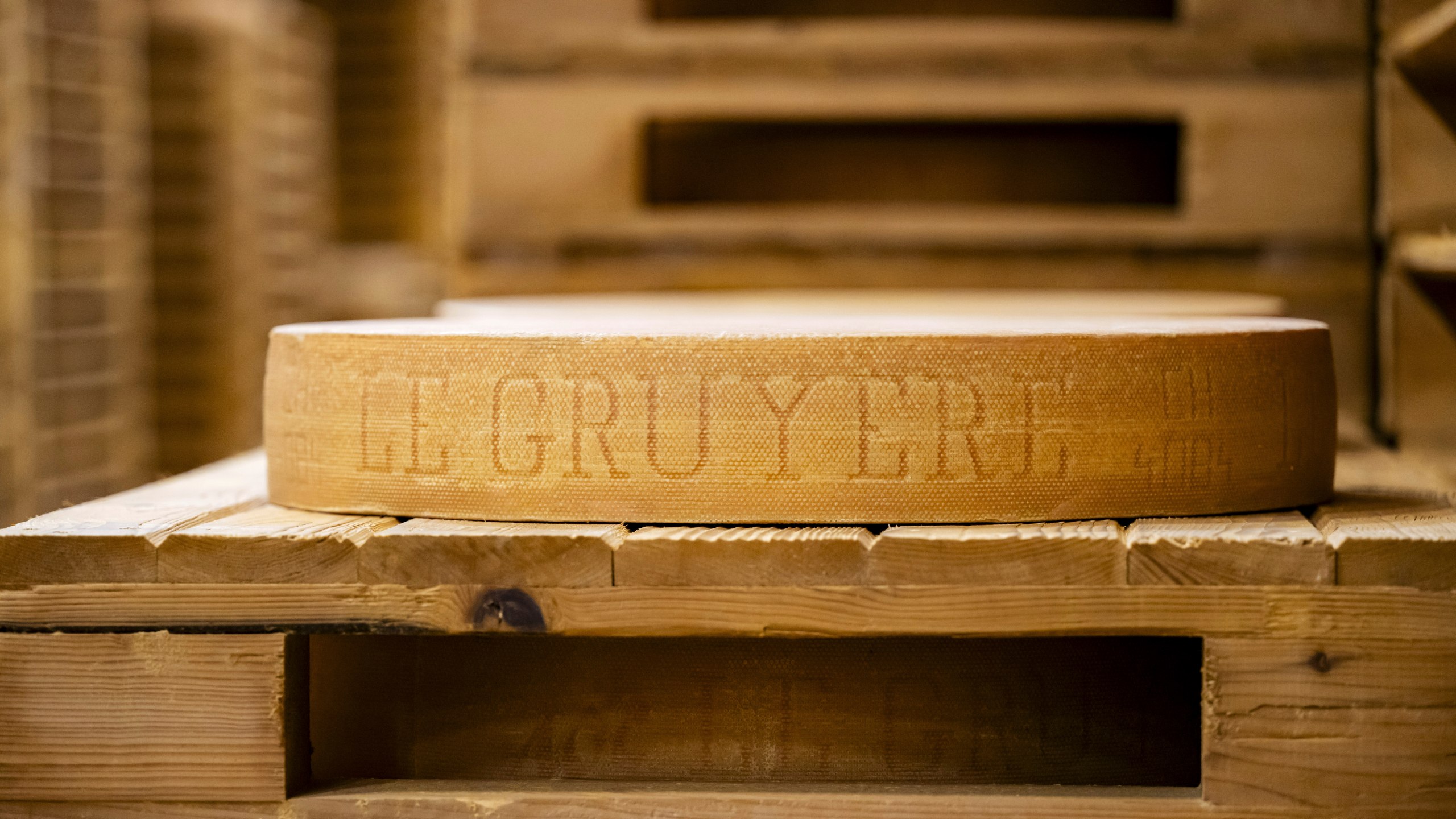 A view of a Gruyere AOP produced by Emmi Group, in Moudon, Switzerland, March 6, 2025. (Jean-Christophe Bott/Keystone via AP)