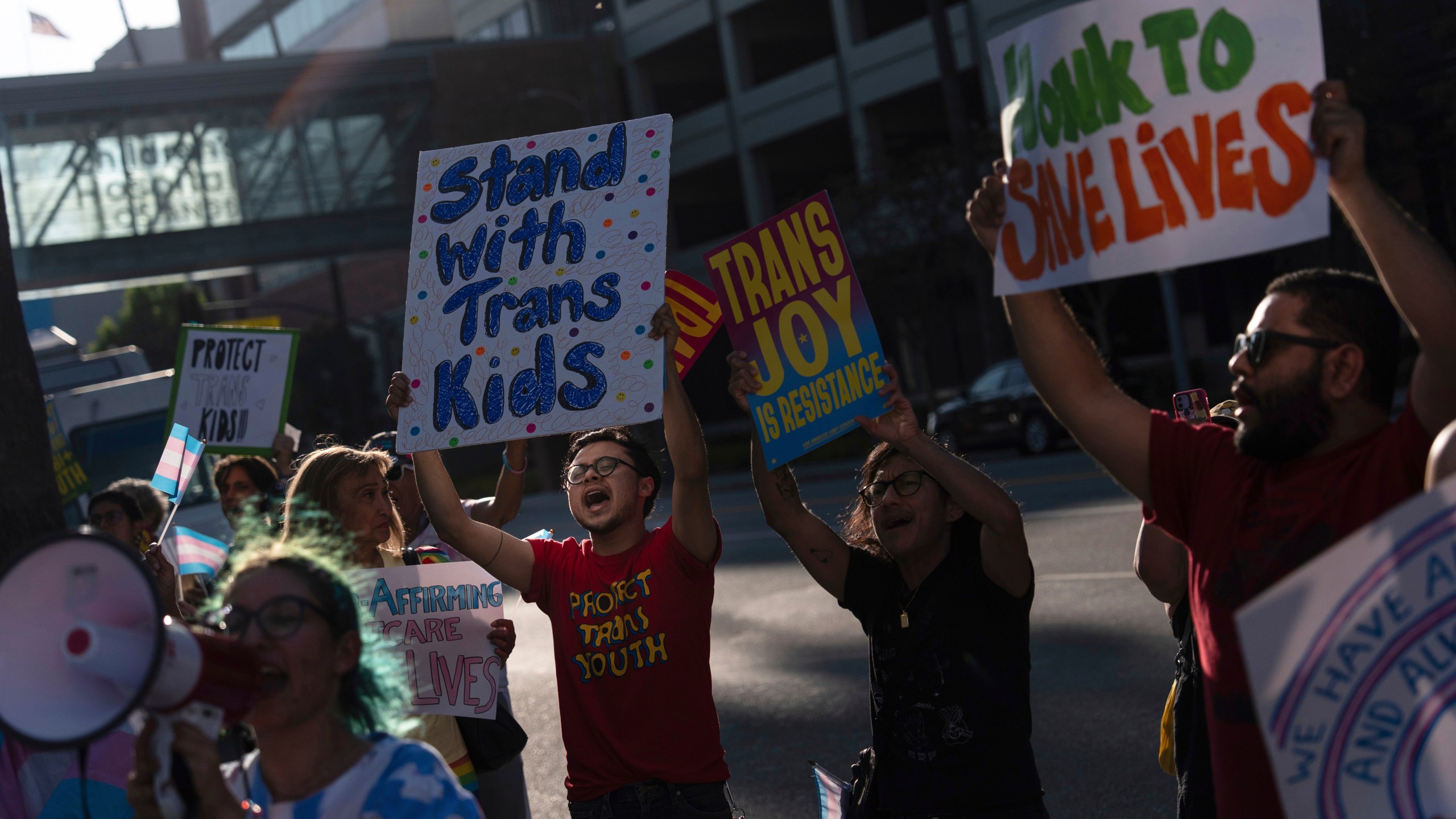 FILE - Protesters chant slogans while demonstrating against the closure of the trans youth clinic at Children's Hospital Los Angeles, July 3, 2025, in Los Angeles. (AP Photo/Jae C. Hong, File)