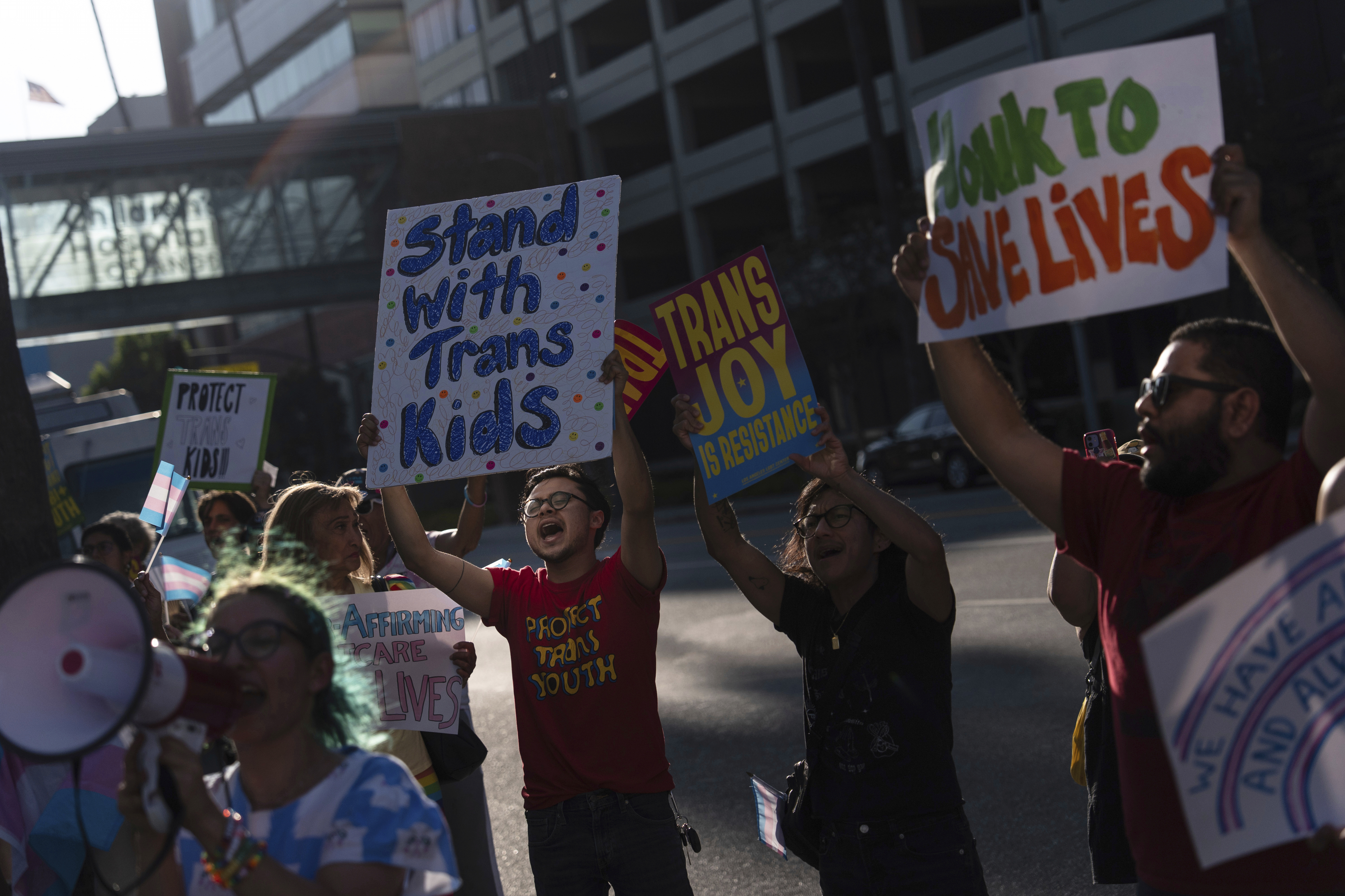 FILE - Protesters chant slogans while demonstrating against the closure of the trans youth clinic at Children's Hospital Los Angeles, July 3, 2025, in Los Angeles. (AP Photo/Jae C. Hong, File)
