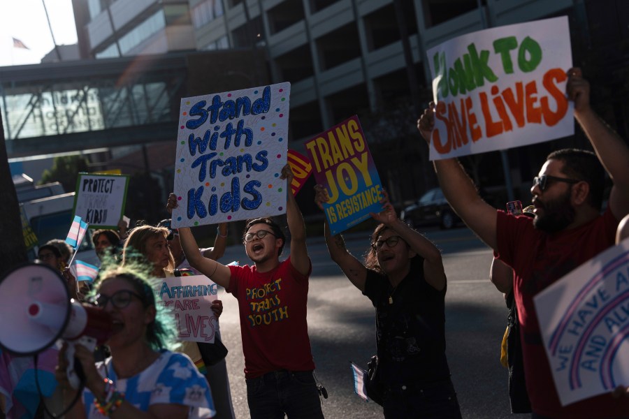 FILE - Protesters chant slogans while demonstrating against the closure of the trans youth clinic at Children's Hospital Los Angeles, July 3, 2025, in Los Angeles. (AP Photo/Jae C. Hong, File)