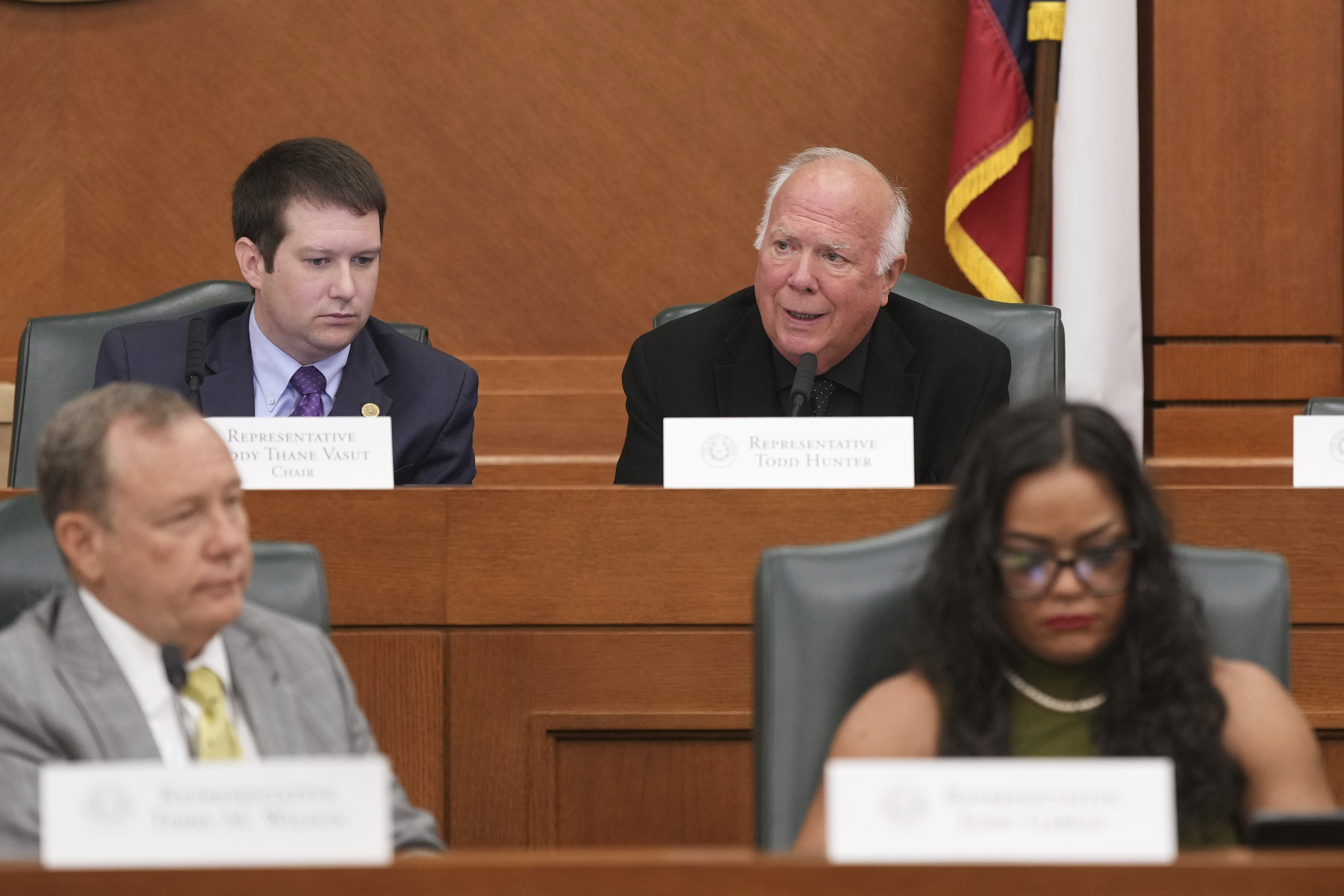Texas State Rep. Todd Hunter, top right, speaks during a public hearing on congressional resistricting in Austin, Texas, Friday, Aug. 1, 2025. (AP Photo/Eric Gay)