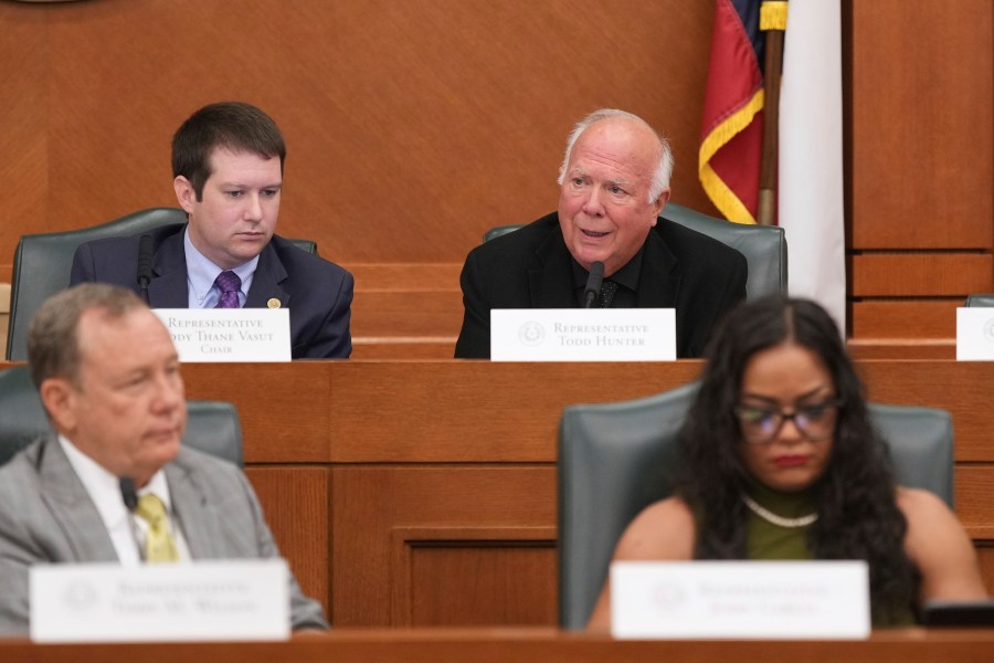 Texas State Rep. Todd Hunter, top right, speaks during a public hearing on congressional resistricting in Austin, Texas, Friday, Aug. 1, 2025. (AP Photo/Eric Gay)