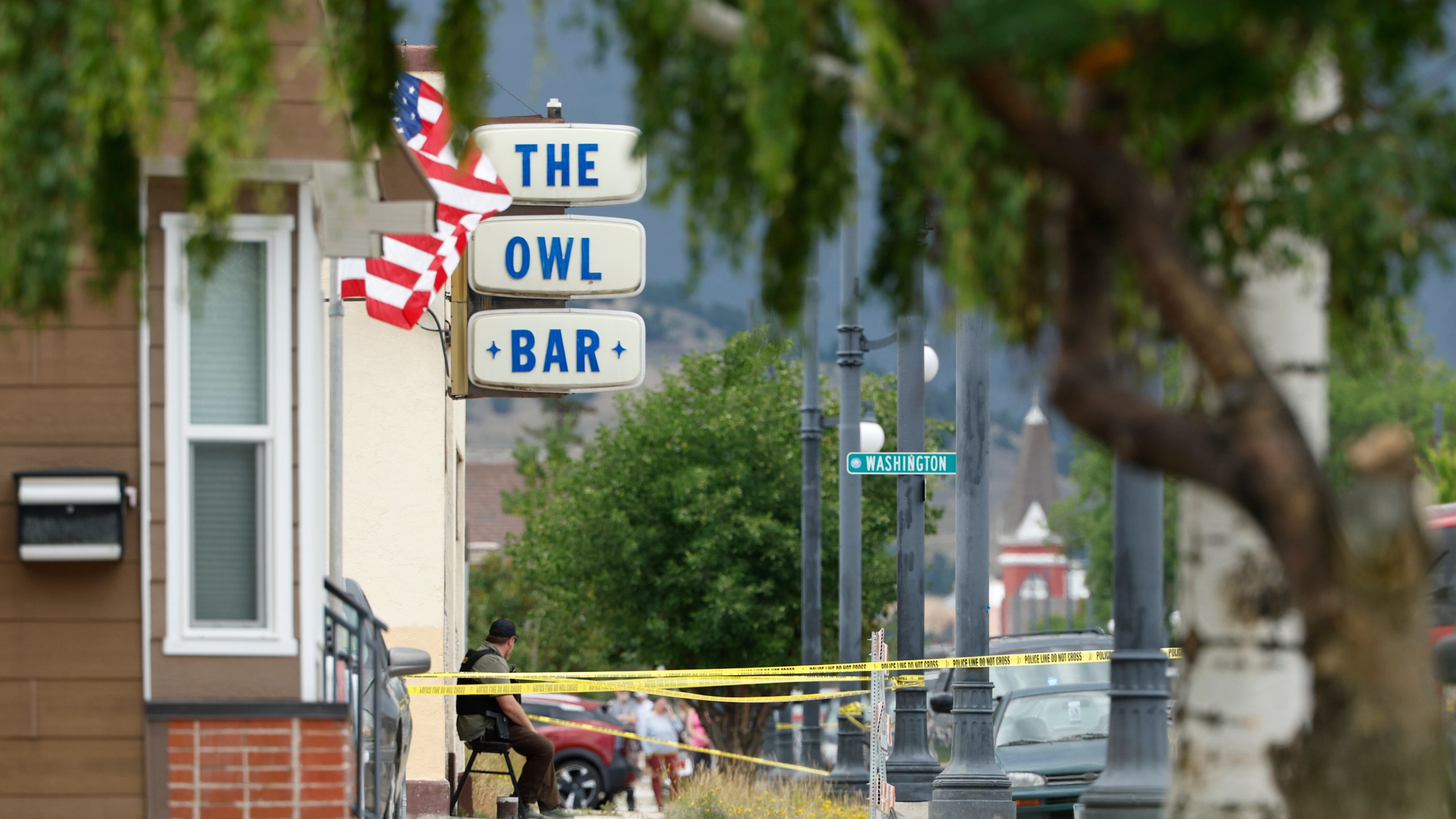 Police tape surrounds The Owl Bar in of Anaconda, Mont., on Friday, Aug. 1, 2025, following a fatal shooting. (Joseph Scheller/The Montana Standard via AP)