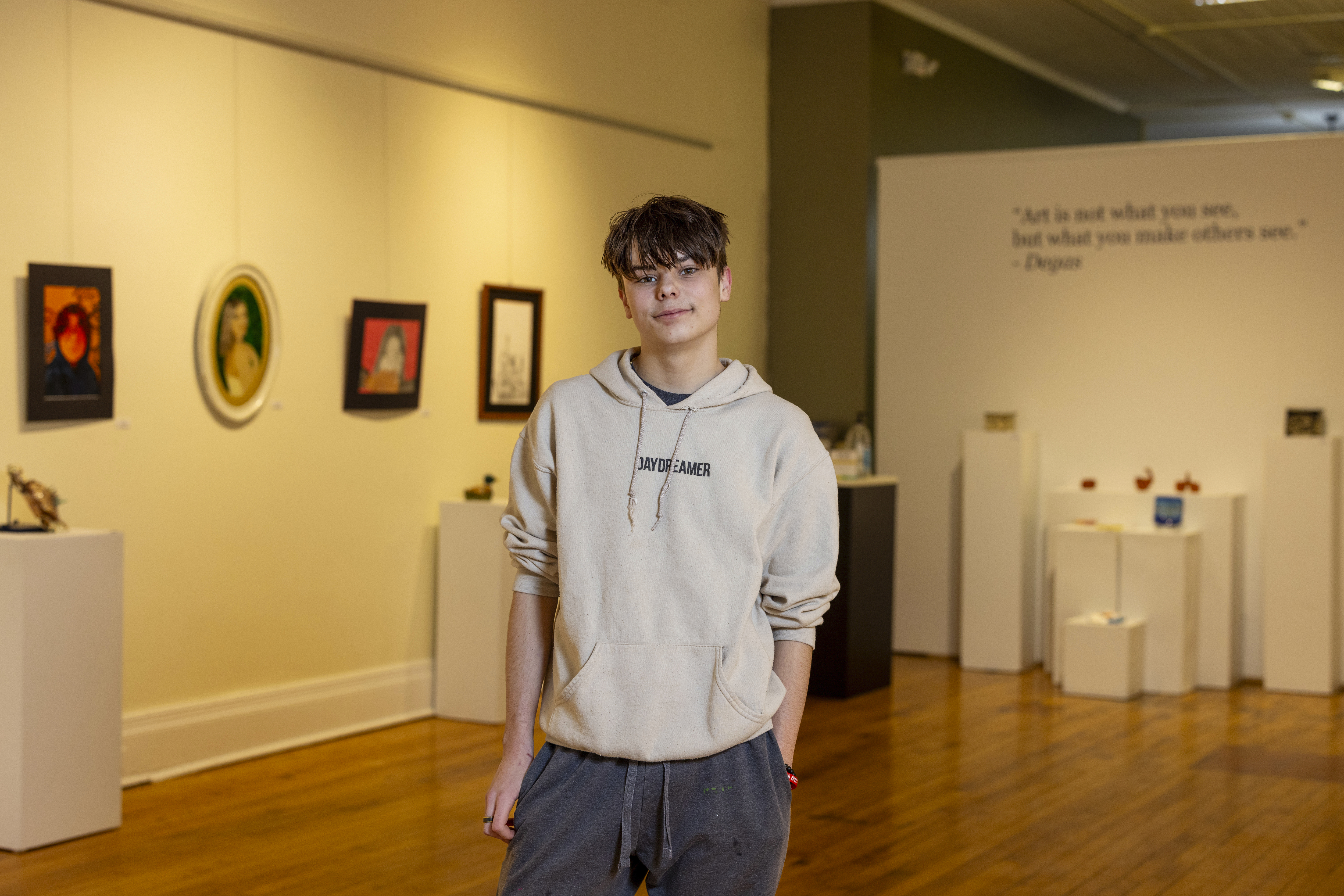 Briar Townes, a senior at Perry Central High School, poses for a portrait inside the Arts Council for Wyoming County, where he has art displayed as part of an All-County High School Arts Show, on March 12, 2025, in Perry, N.Y. (AP Photo/Lauren Petracca)