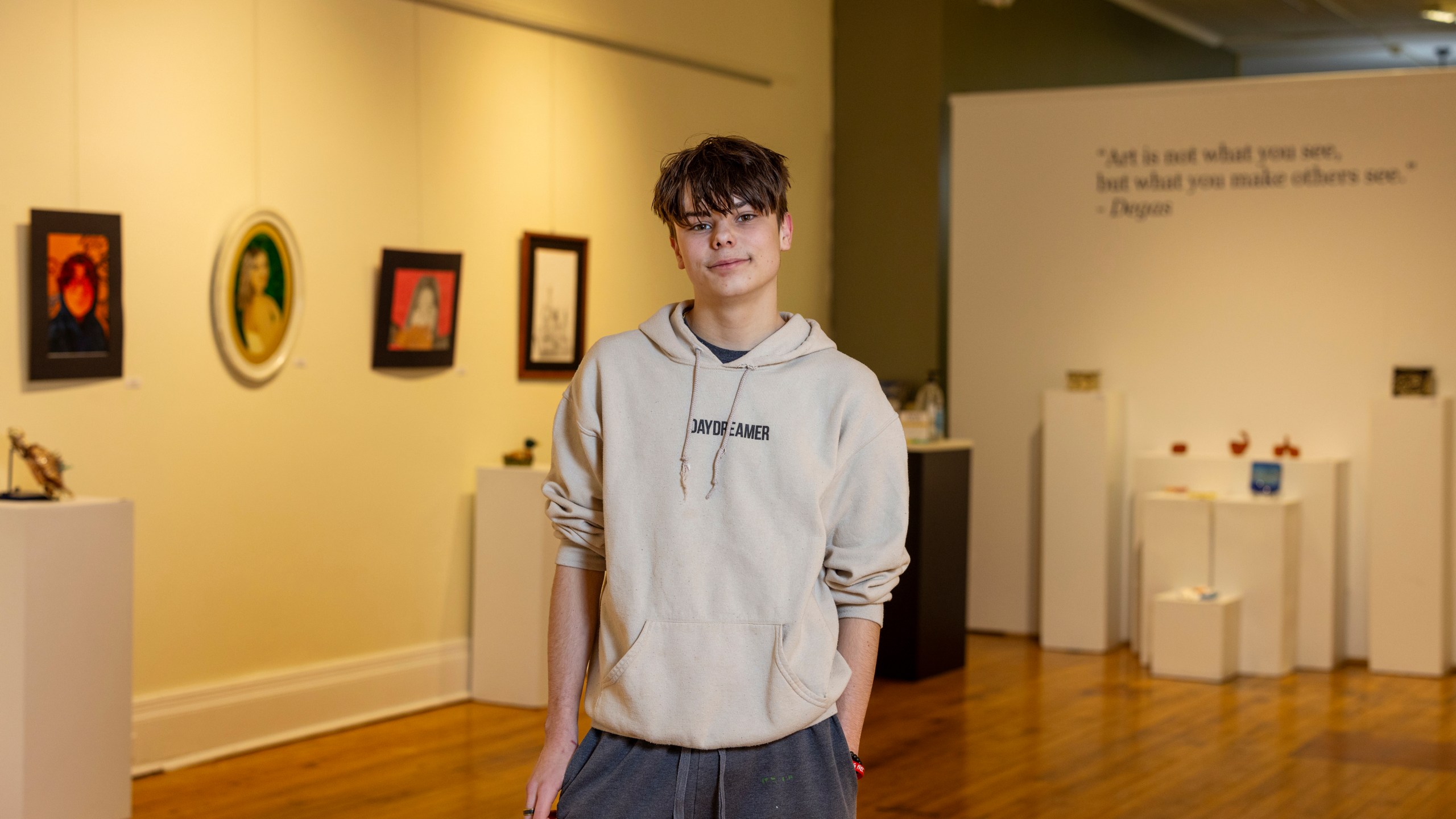 Briar Townes, a senior at Perry Central High School, poses for a portrait inside the Arts Council for Wyoming County, where he has art displayed as part of an All-County High School Arts Show, on March 12, 2025, in Perry, N.Y. (AP Photo/Lauren Petracca)