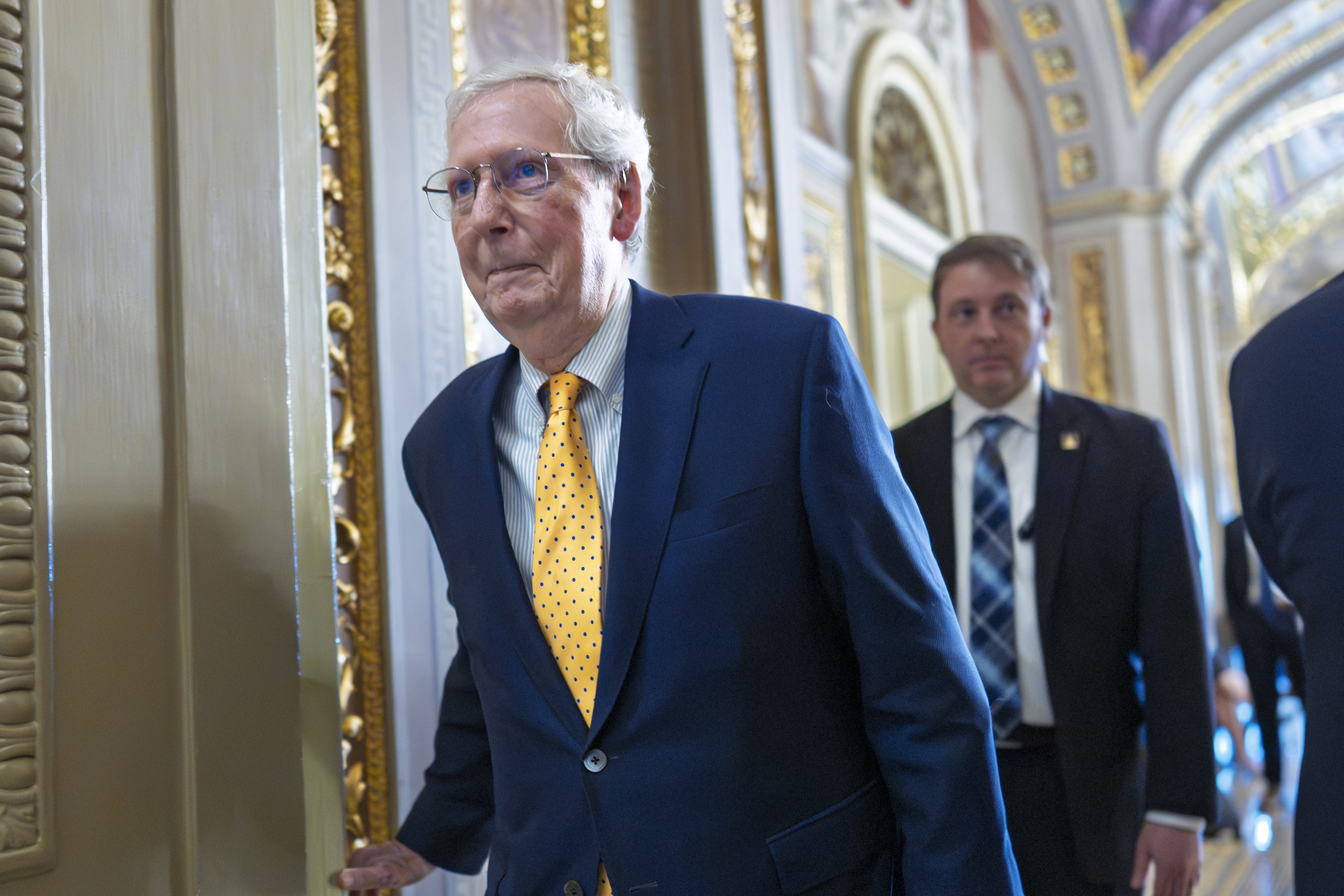 FILE -Sen. Mitch McConnell, R-Ky., the former Senate Republican leader and member of the Senate Appropriations Committee, leaves the chamber as the Senate votes to reject a war powers resolution authored by Sen. Tim Kaine of Virginia, aimed to affirm that Trump should seek authorization from Congress before launching more military action against Iran, at the Capitol in Washington, June 27, 2025. (AP Photo/J. Scott Applewhite), File)
