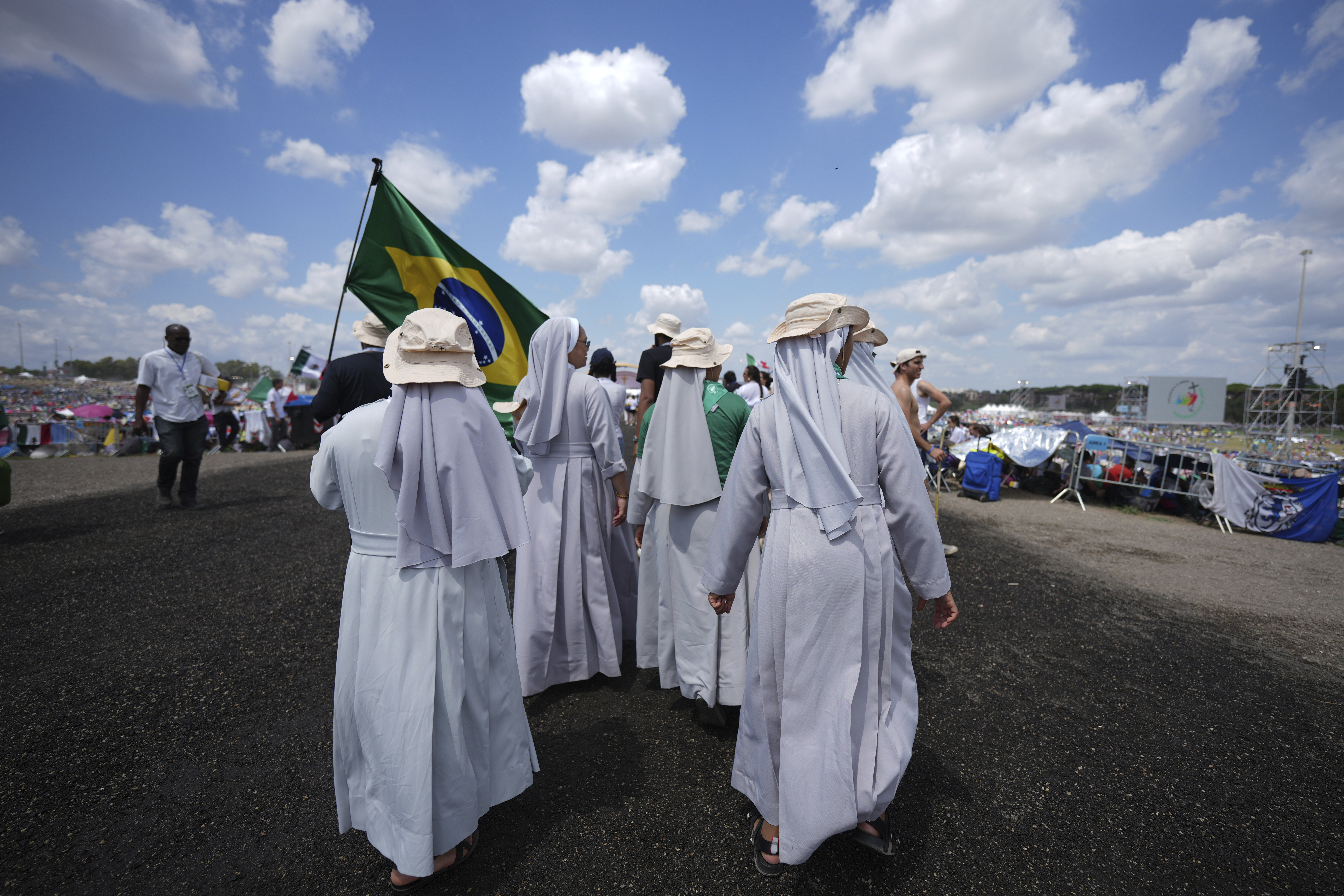 Young people participate in the Youths Jubilee at the Tor Vergata field in Rome, Saturday, Aug. 2, 2025. (AP Photo/Andrew Medichini)