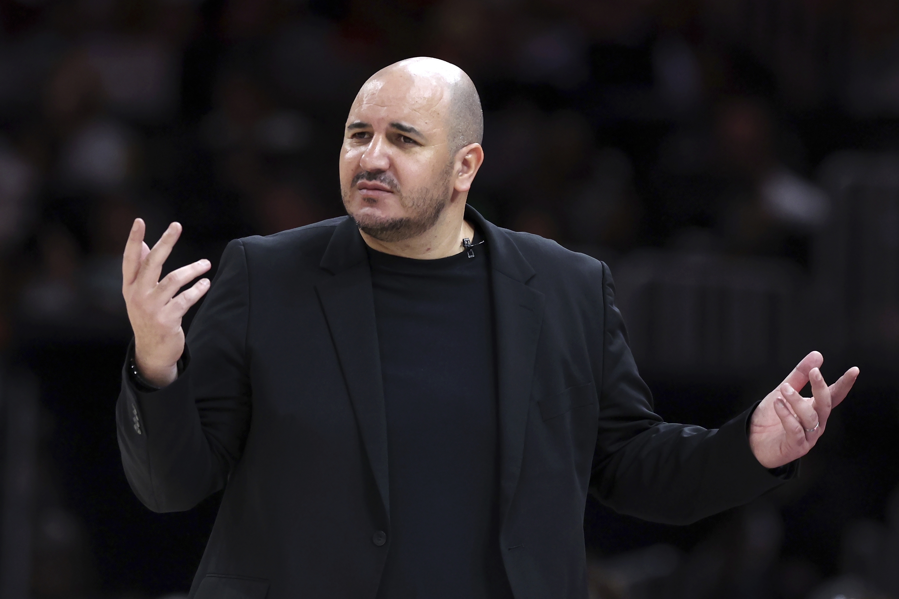 Connecticut Sun head coach Rachid Meziane gestures during the second half of a WNBA basketball game against the Indiana Fever, Tuesday, July 15, 2025, in Boston. (AP Photo/Michael Dwyer)