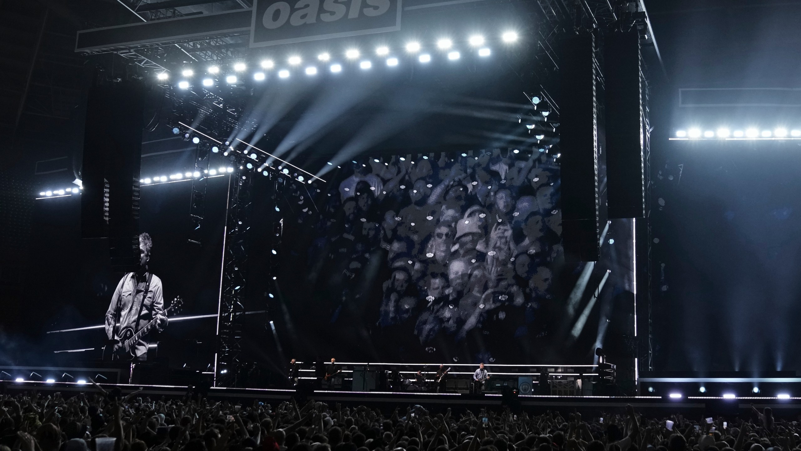 Oasis perform during their reunion concert on Friday, July 4, 2025, in Cardiff. (Photo by Scott A Garfitt/Invision/AP)