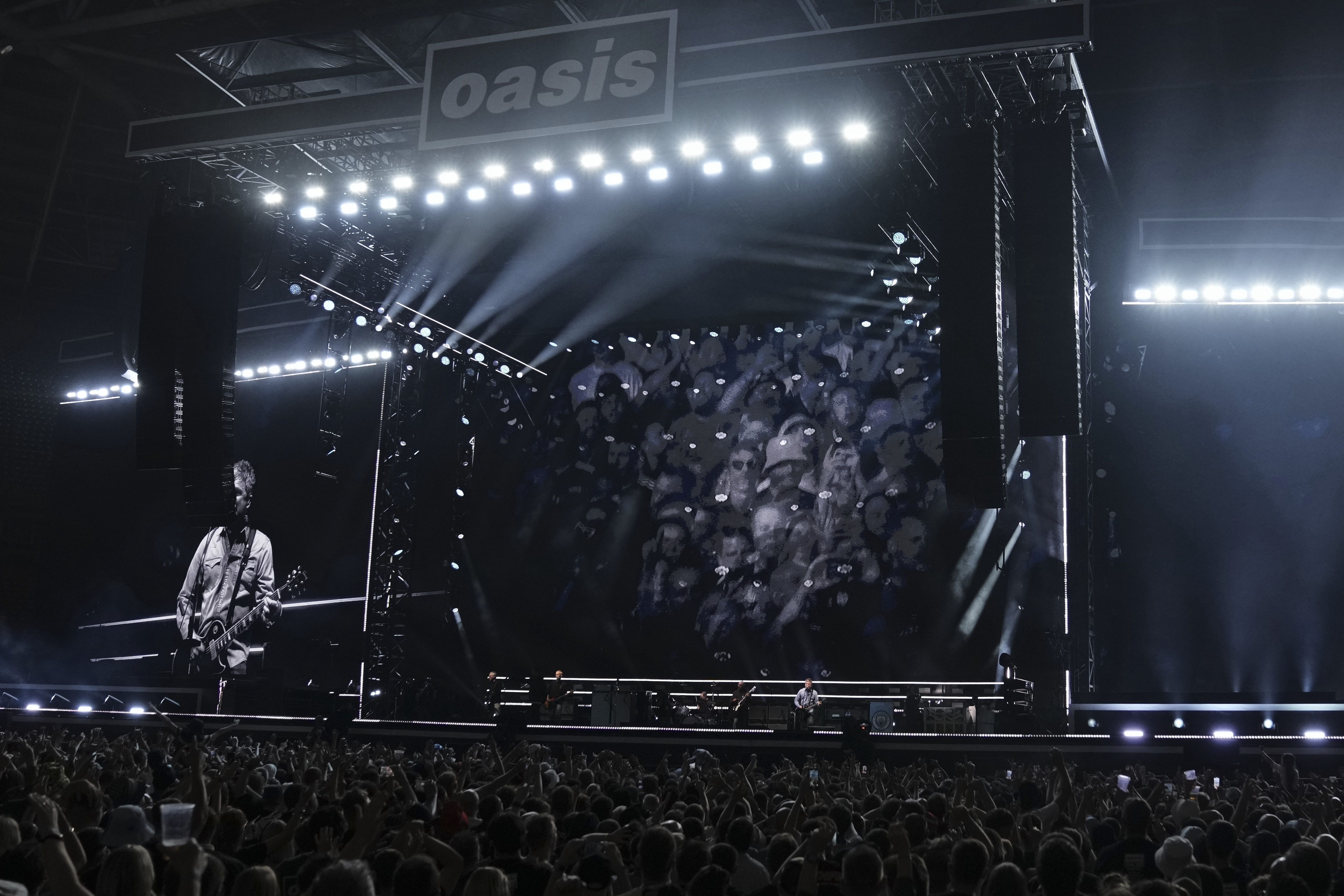 Oasis perform during their reunion concert on Friday, July 4, 2025, in Cardiff. (Photo by Scott A Garfitt/Invision/AP)