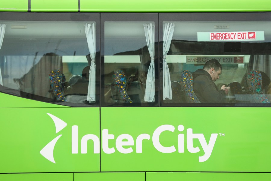 An Intercity bus prepares to depart from Timaru, New Zealand on Oct. 14, 2022. (Aiman Amerul Muner/STUFF via AP)